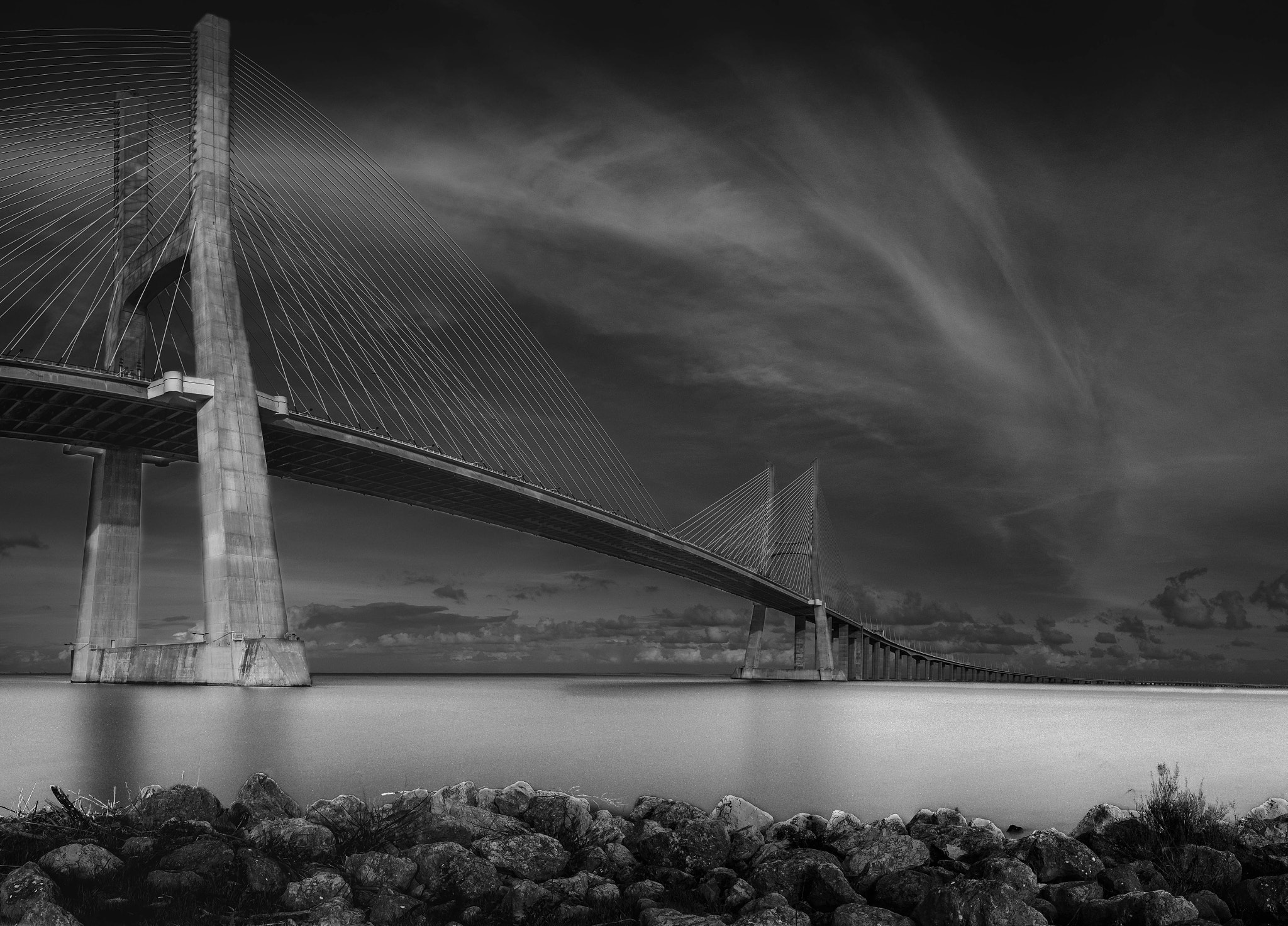 Fujifilm X-T1 + Fujifilm XF 14mm F2.8 R sample photo. Vasco da gama bridge bw photography