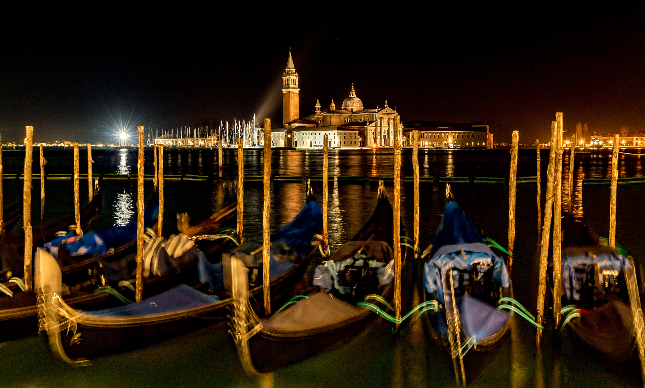 Sony a7R + Sony Vario Tessar T* FE 24-70mm F4 ZA OSS sample photo. Venetian gondolas at night photography