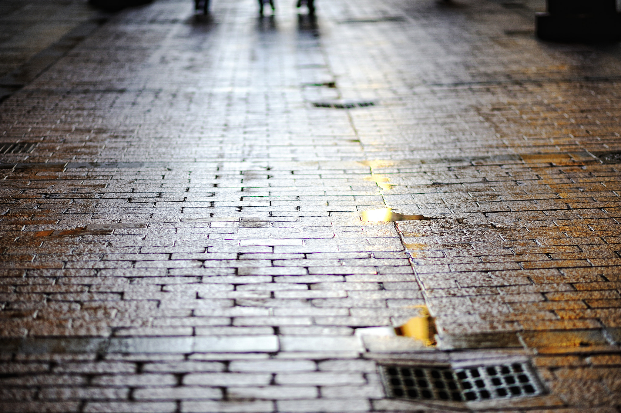 Nikon D700 + AF DC-Nikkor 135mm f/2D sample photo. Wet streets photography