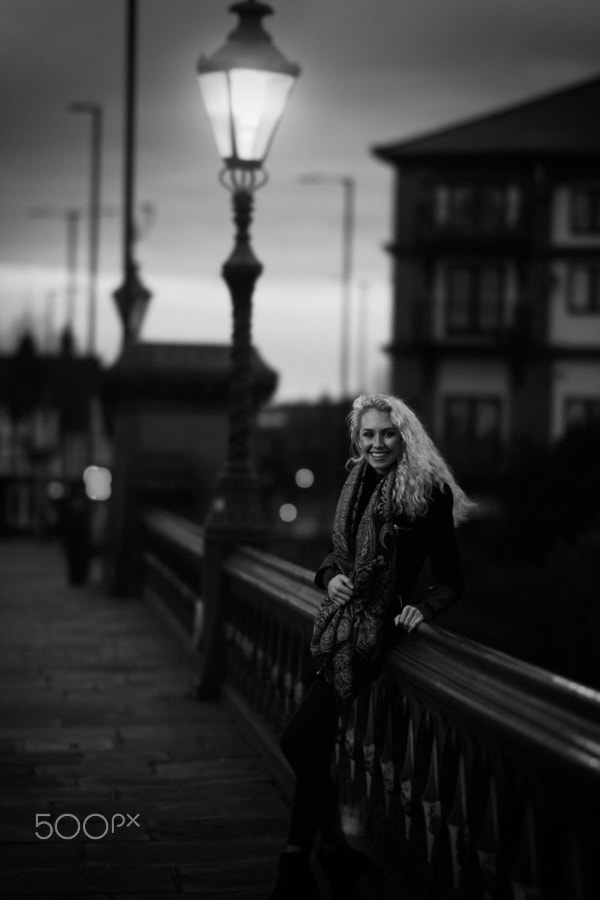 Sony a6000 sample photo. Trent bridge under a street light young girl bw photography