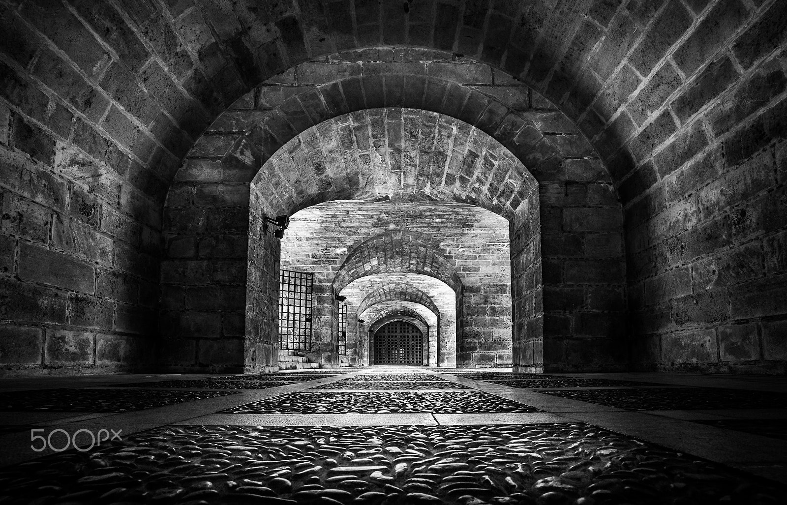 Canon EF 17-35mm f/2.8L sample photo. Arched ceiling and pabbled floor photography