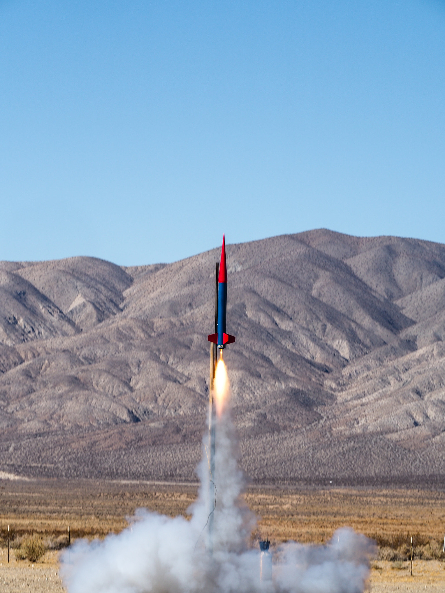 Olympus OM-D E-M5 sample photo. Nike smoke in the mojave desert photography