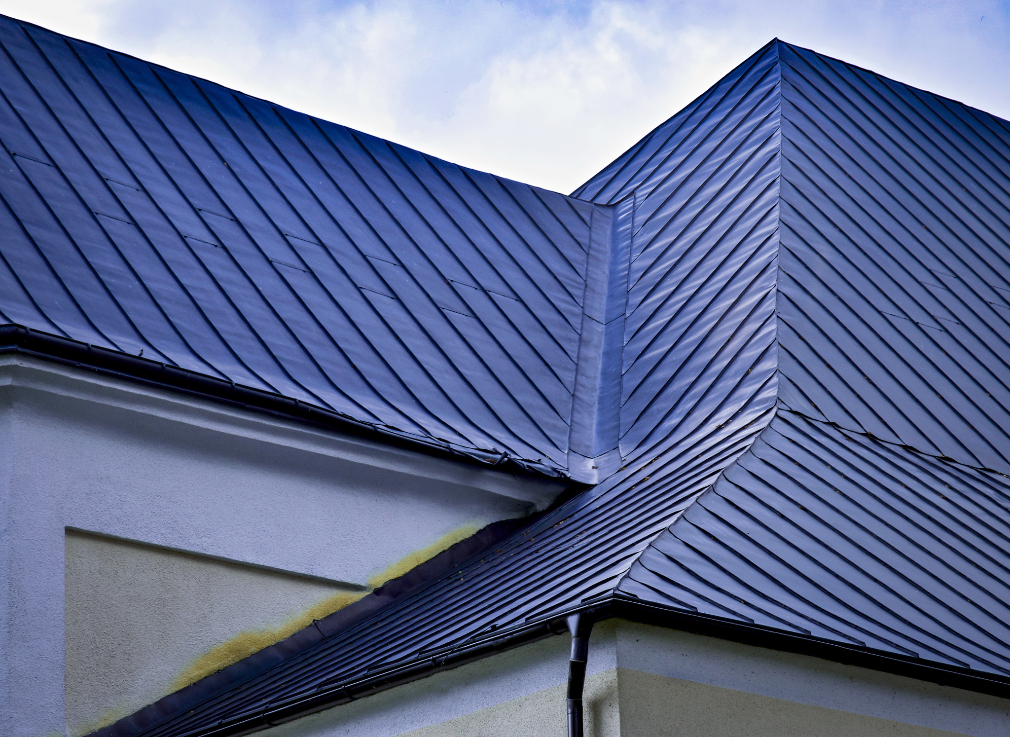 Nikon D5500 sample photo. Indented blue metal roof photography