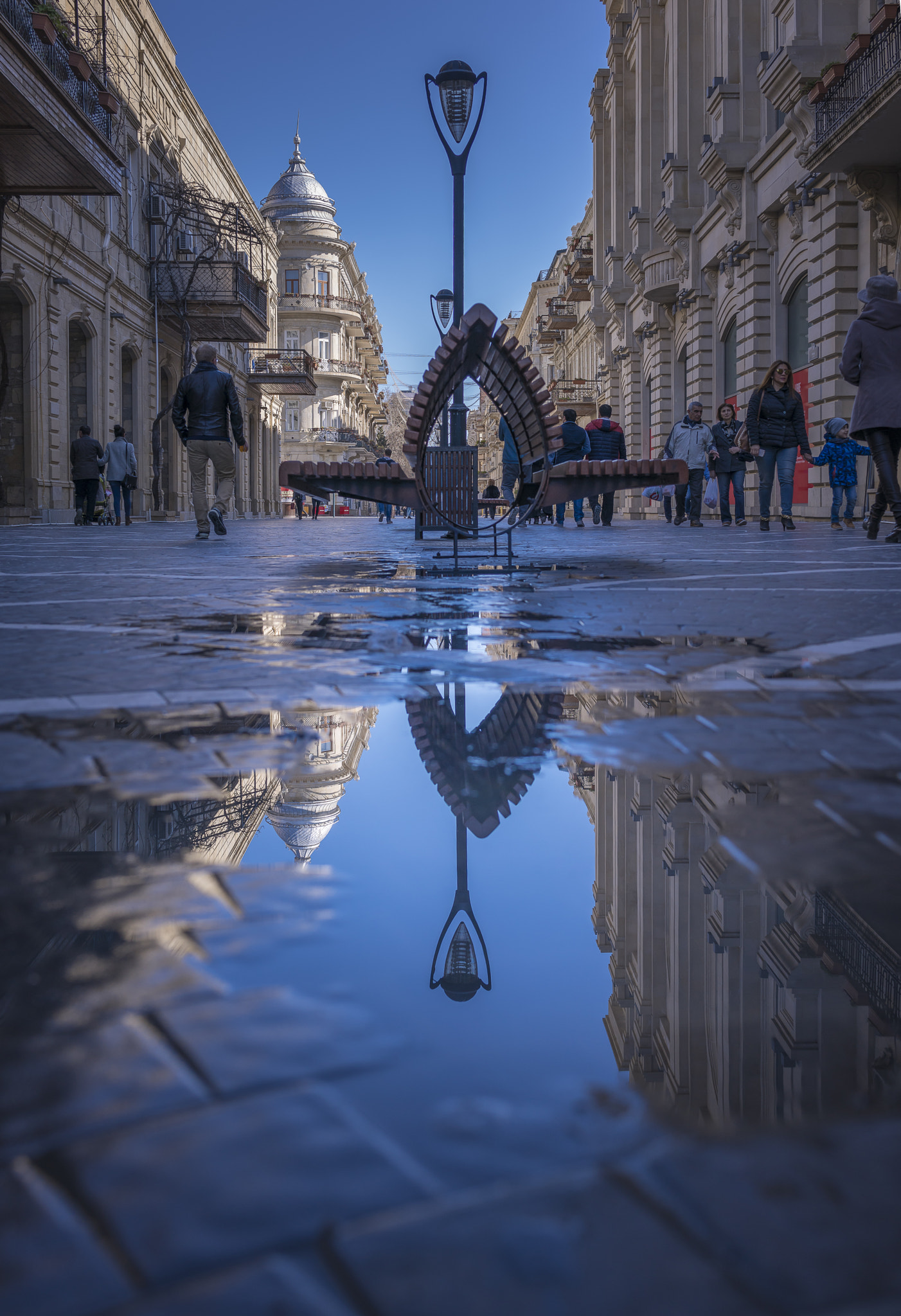 35mm F2.0 sample photo. Street reflection photography