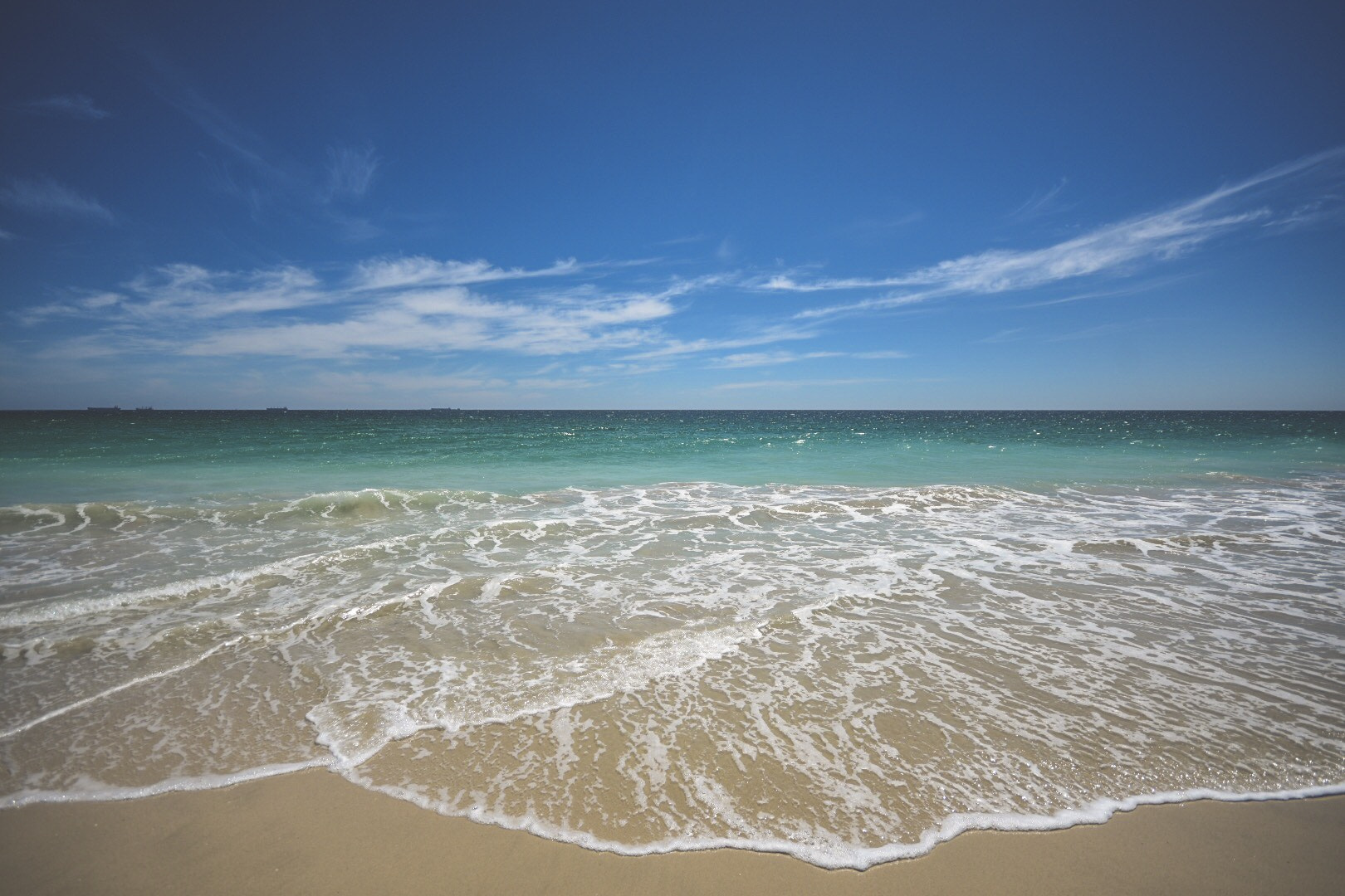 Sigma 10-20mm F4-5.6 EX DC HSM sample photo. The wash coming up the sand at port beach photography