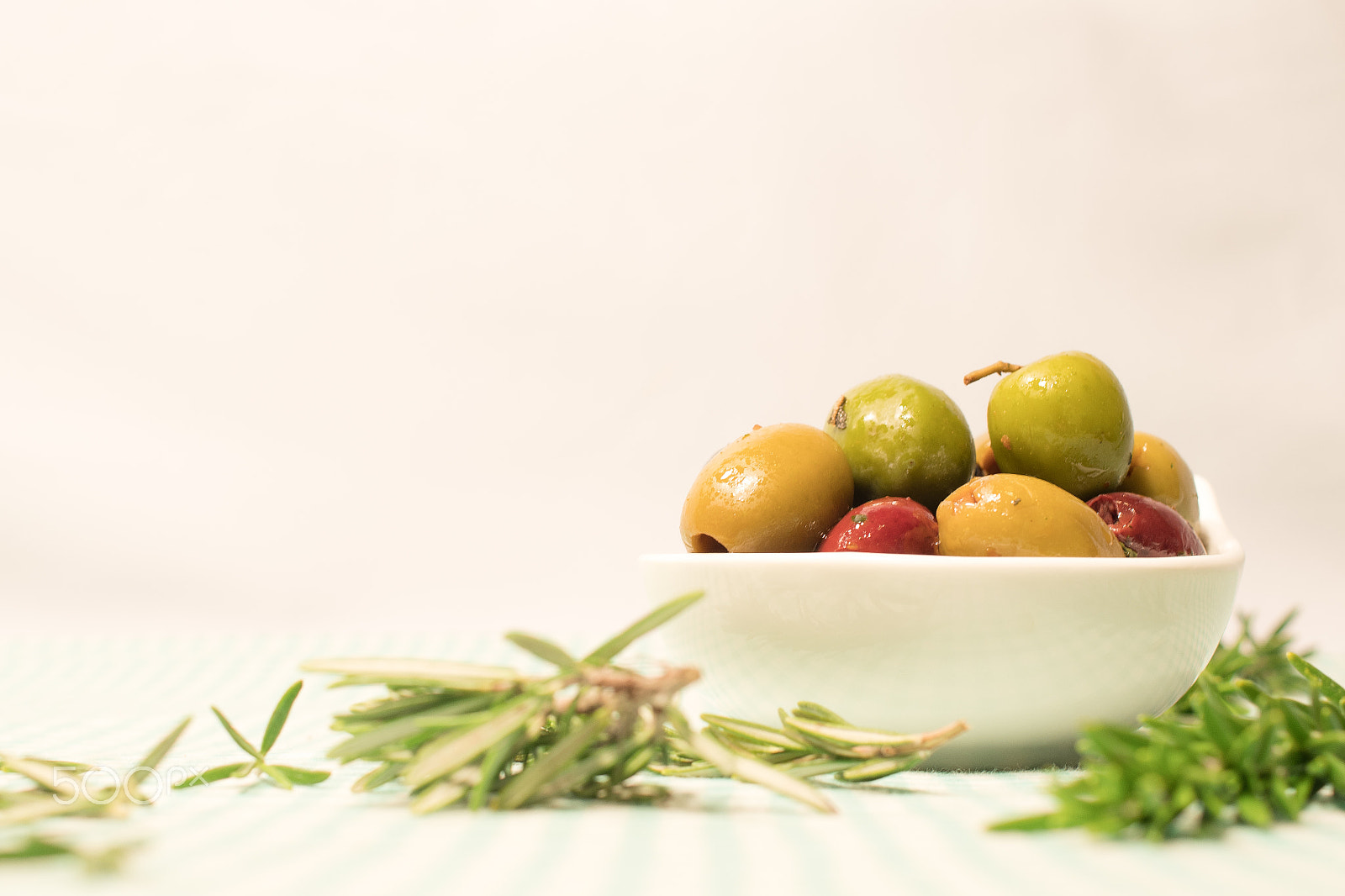 Pentax K-S2 sample photo. Mix olives and rosemary on a table photography