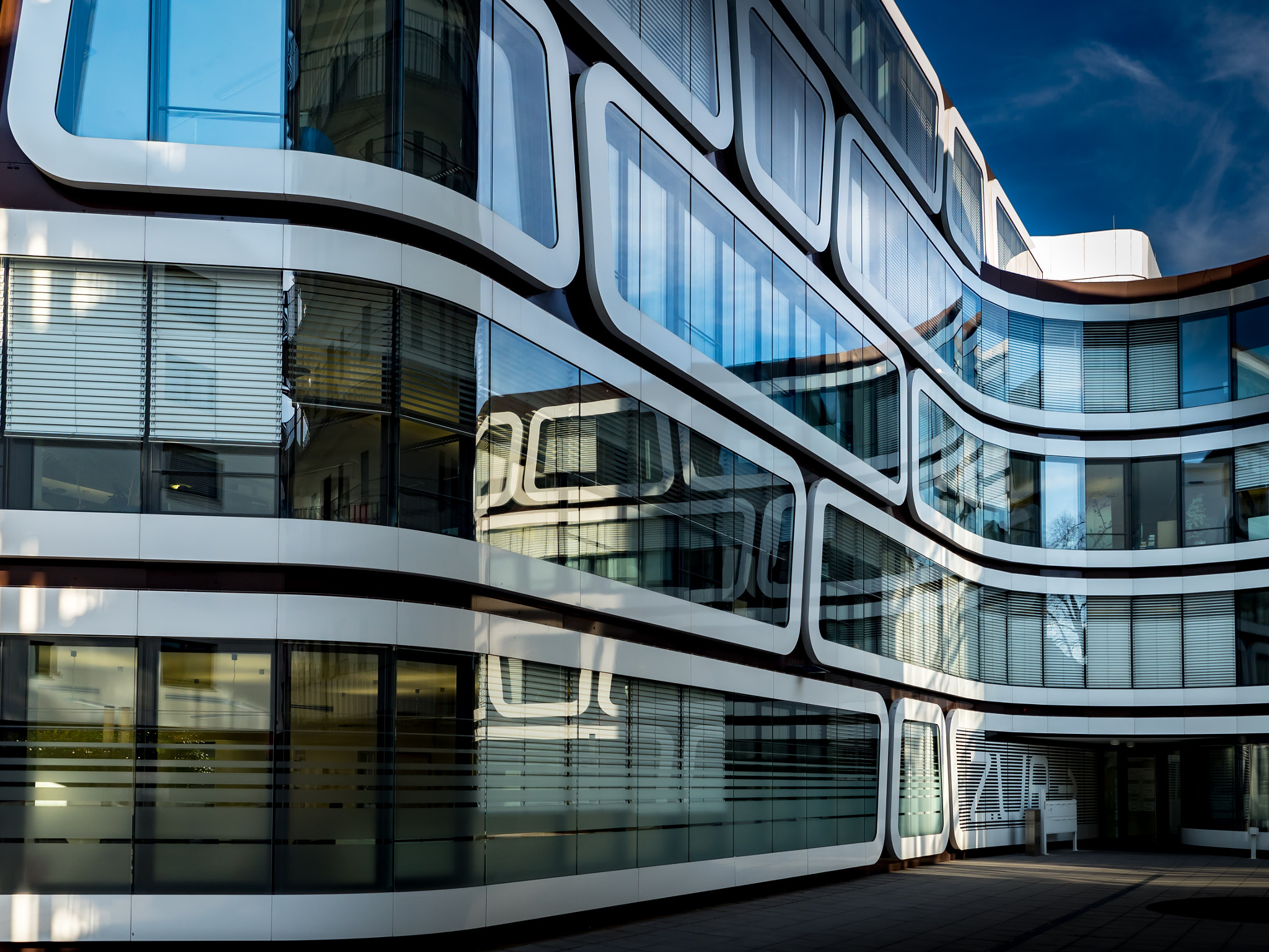 Olympus OM-D E-M5 II + Olympus M.Zuiko Digital ED 7-14mm F2.8 PRO sample photo. Facade of the office building z-up in stuttgart photography