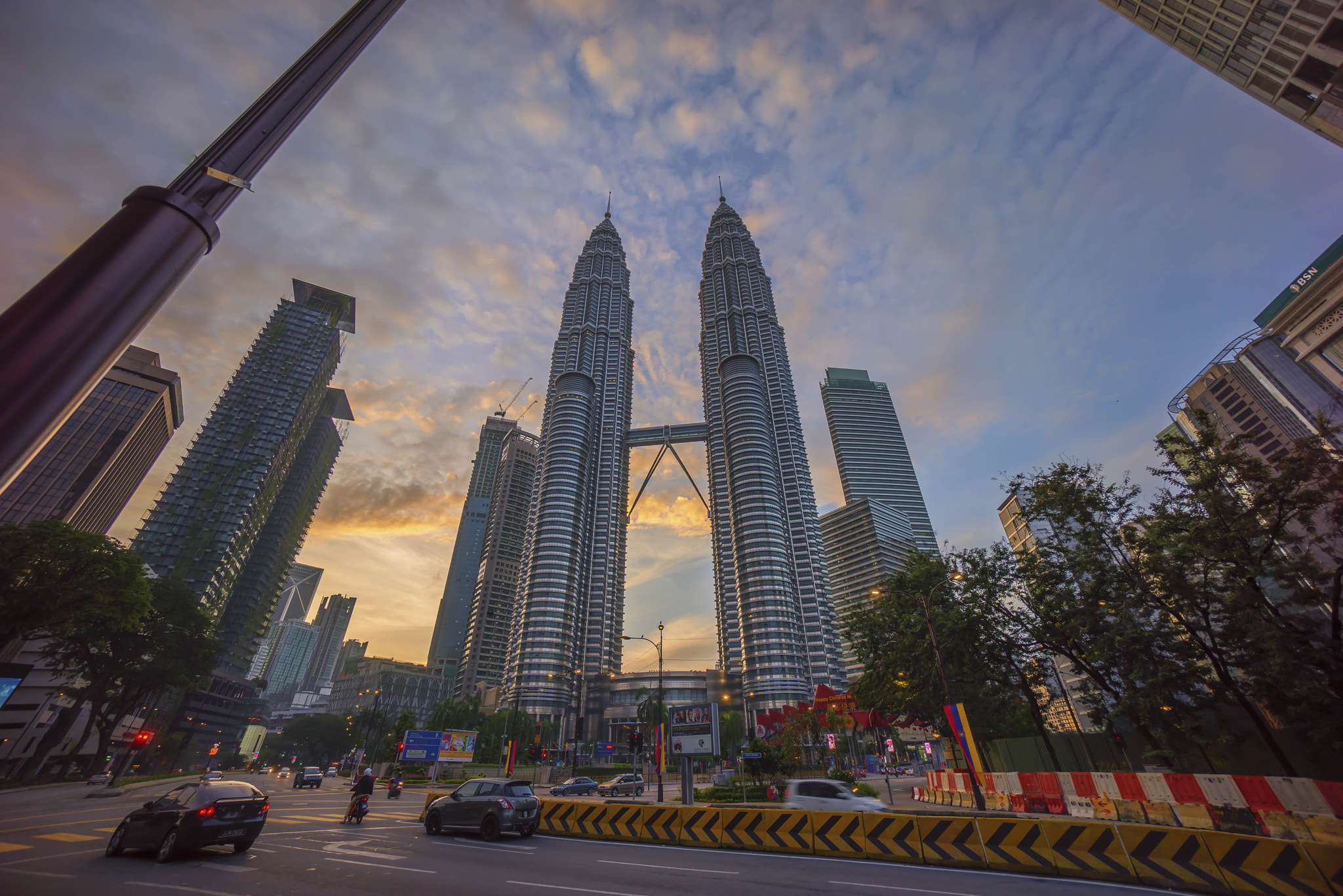 Sony a7R + Sony E 10-18mm F4 OSS sample photo. Road junction at suria klcc petronas twin tower photography