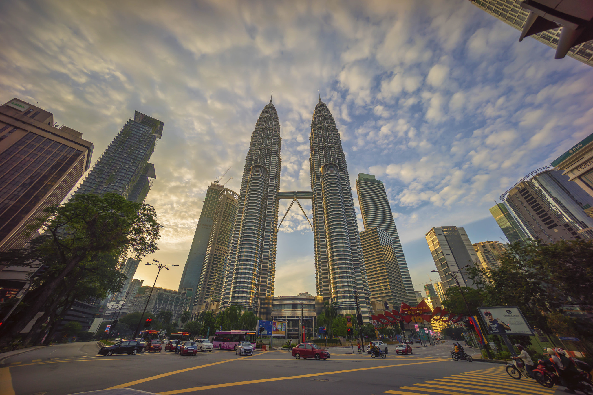 Sony a7R + Sony E 10-18mm F4 OSS sample photo. Road junction at suria klcc petronas twin tower photography