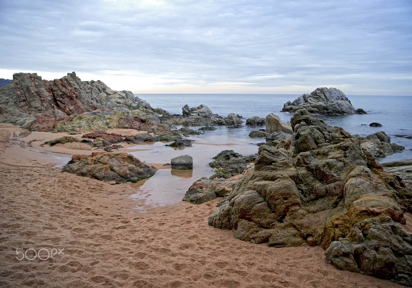 Samsung NX500 + Samsung NX 16-50mm F3.5-5.6 Power Zoom ED OIS sample photo. Sand and rocks photography
