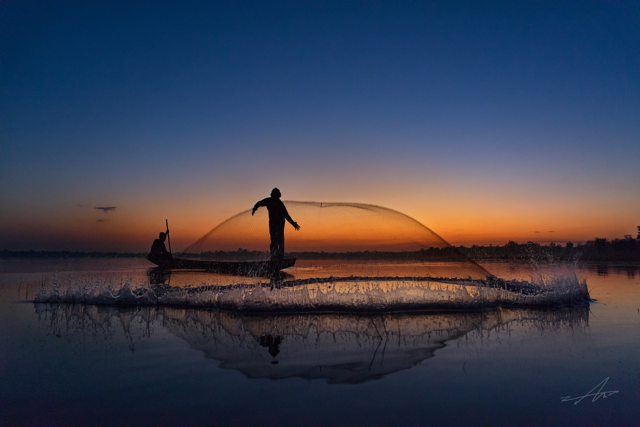 Sony a7R + Sony Vario Tessar T* FE 24-70mm F4 ZA OSS sample photo. Silhouette of traditional fishermen throwing net. photography