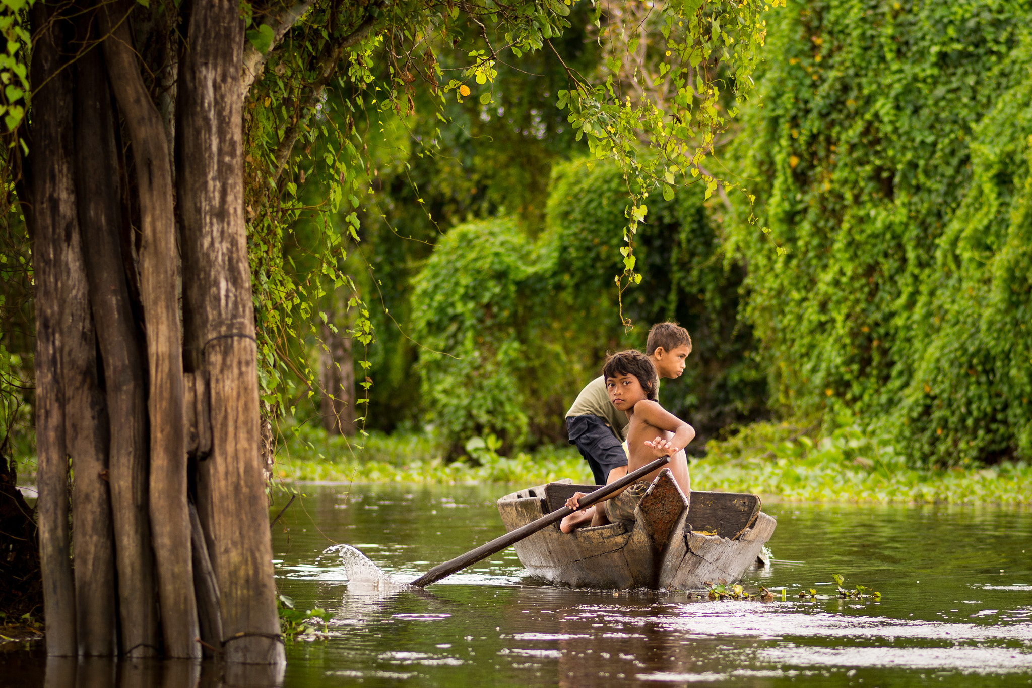 Nikon D7100 + Tokina AT-X Pro 100mm F2.8 Macro sample photo. Young boatman photography