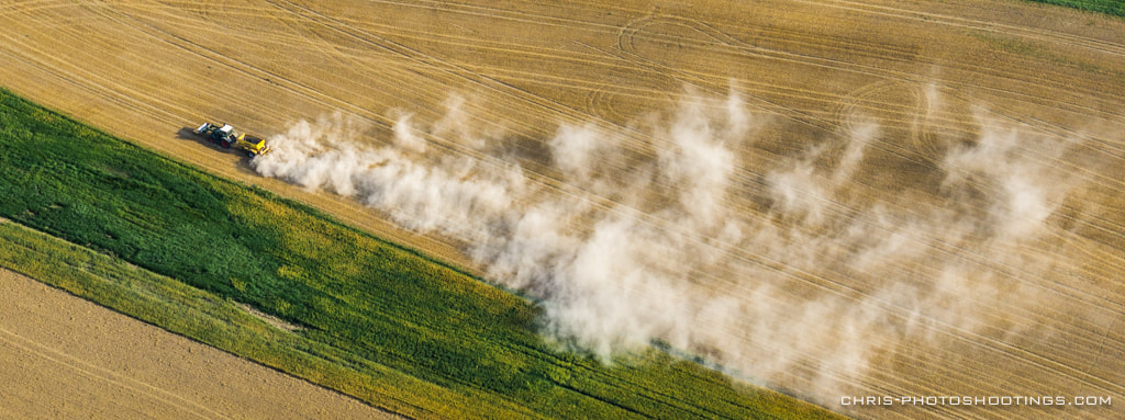 Sony a6000 + Sony FE 70-200mm F4 G OSS sample photo. Working the fields photography