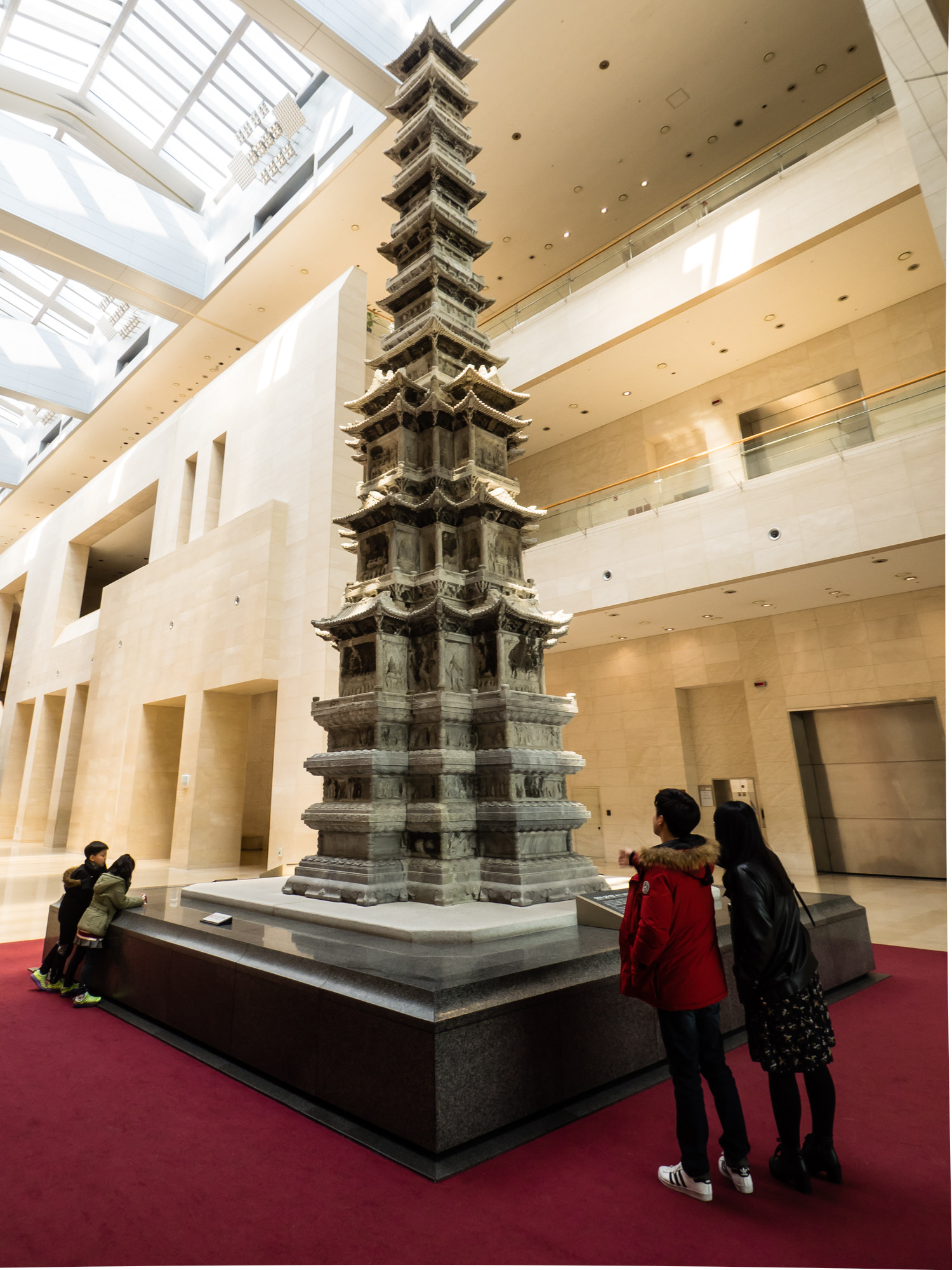 OLYMPUS M.9-18mm F4.0-5.6 sample photo. Stone tower in museum photography