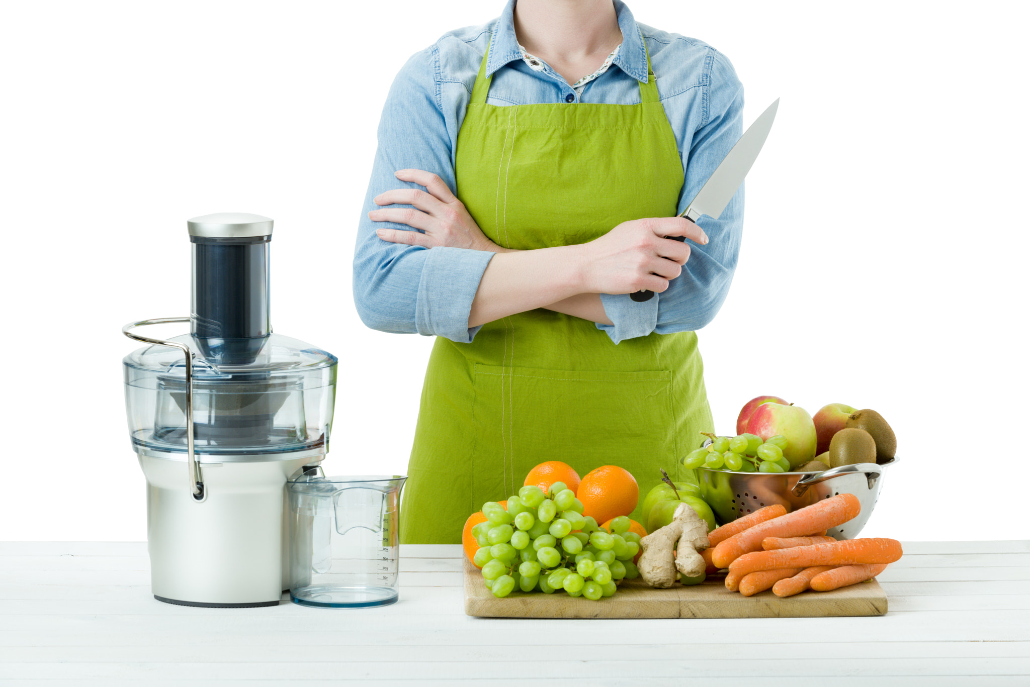 Nikon D810 sample photo. Anonymous woman wearing an apron, preparing fresh fruit juice using modern electric juicer,... photography