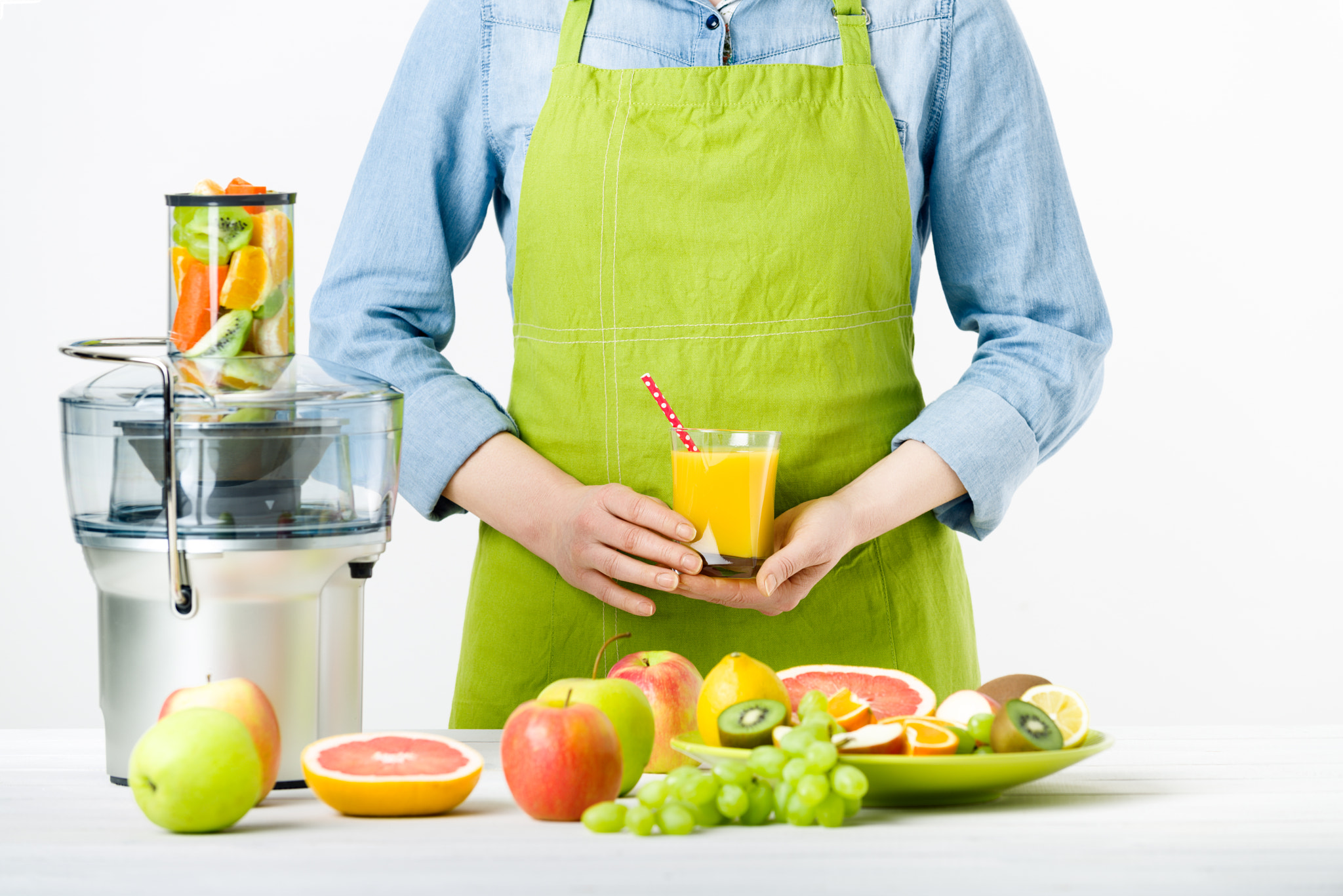 Nikon D810 sample photo. Anonymous woman wearing an apron, holding glass of freshly pressed juice, healthy lifestyle... photography