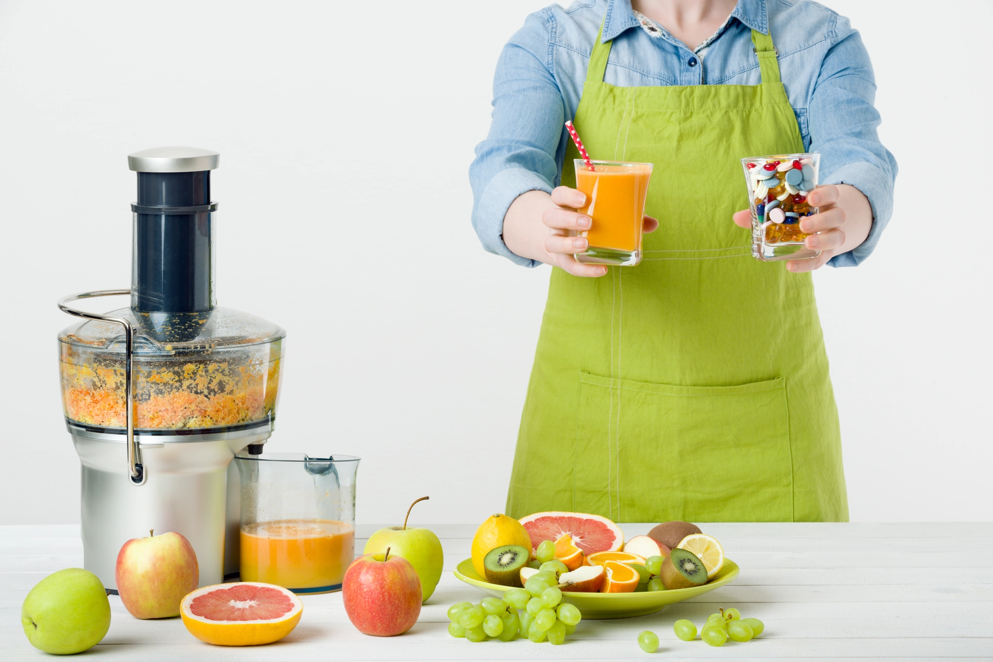 Nikon D810 sample photo. Healthy lifestyle and diet concept. fruit juice, pills and vitamin supplements, woman making a... photography