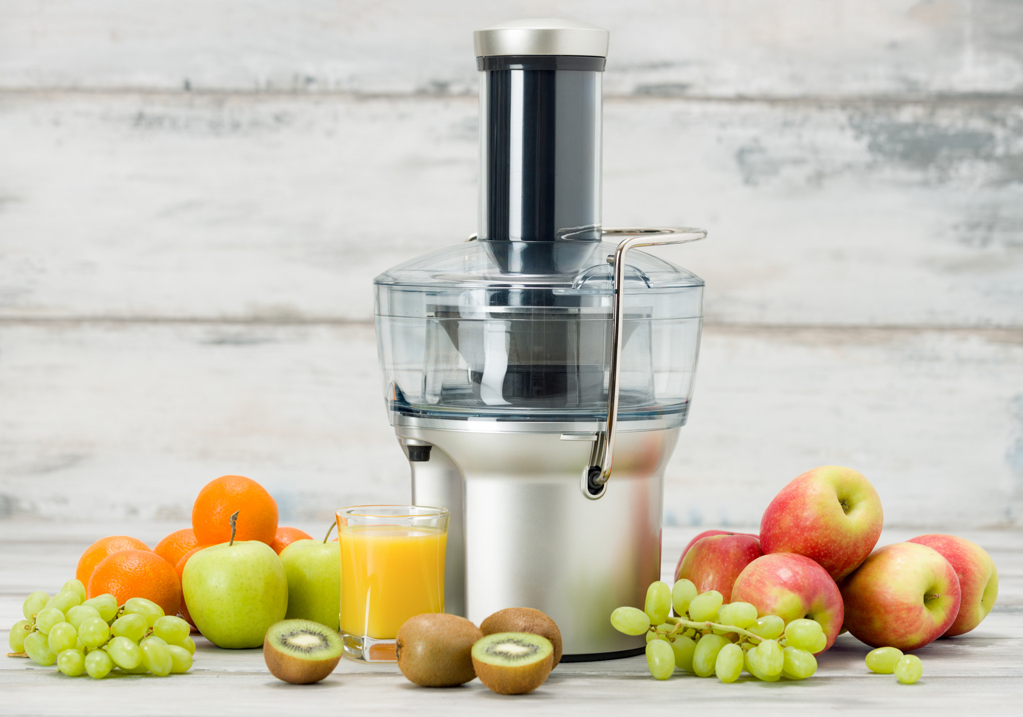 Nikon D810 sample photo. Modern electric juicer, various fruit and glass of freshly made juice, healthy lifestyle concept photography