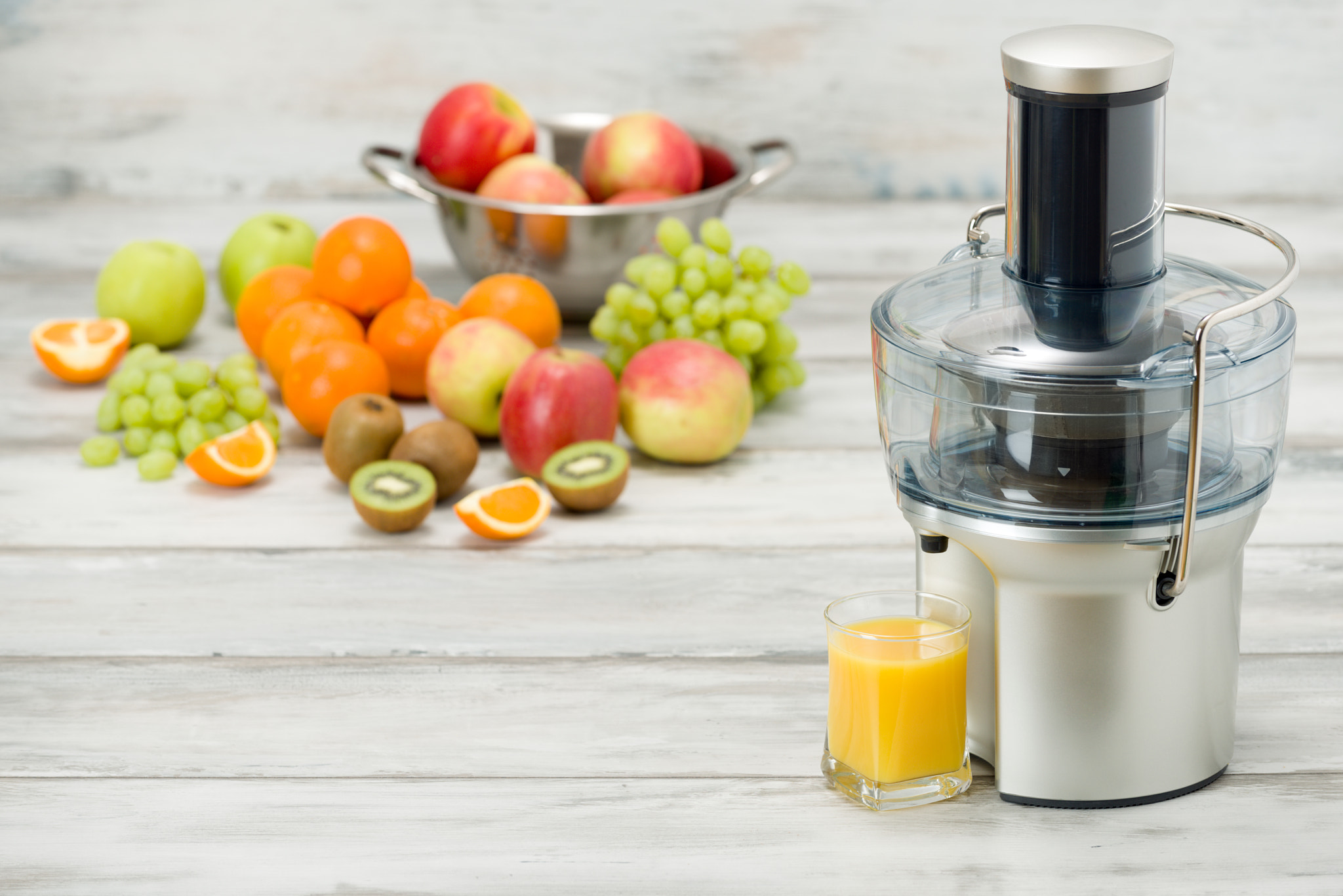 Nikon D810 sample photo. Modern electric juicer, various fruit and glass of freshly made juice, healthy lifestyle concept photography