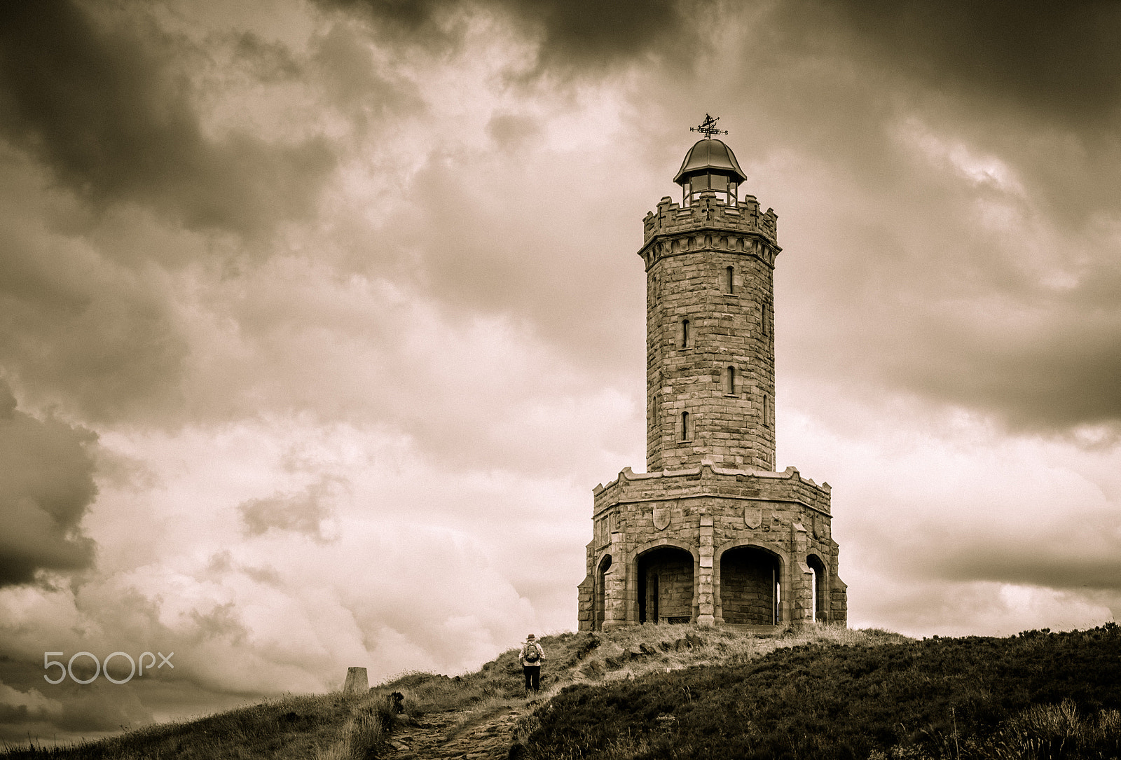Sigma 17-70mm F2.8-4 DC Macro OS HSM sample photo. Jubilee tower and the lone hiker photography