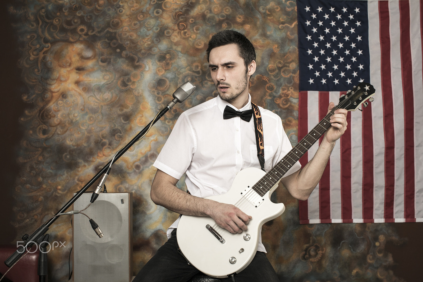 Canon EF 50mm F1.2L USM sample photo. Rocker playing electric guitar photography