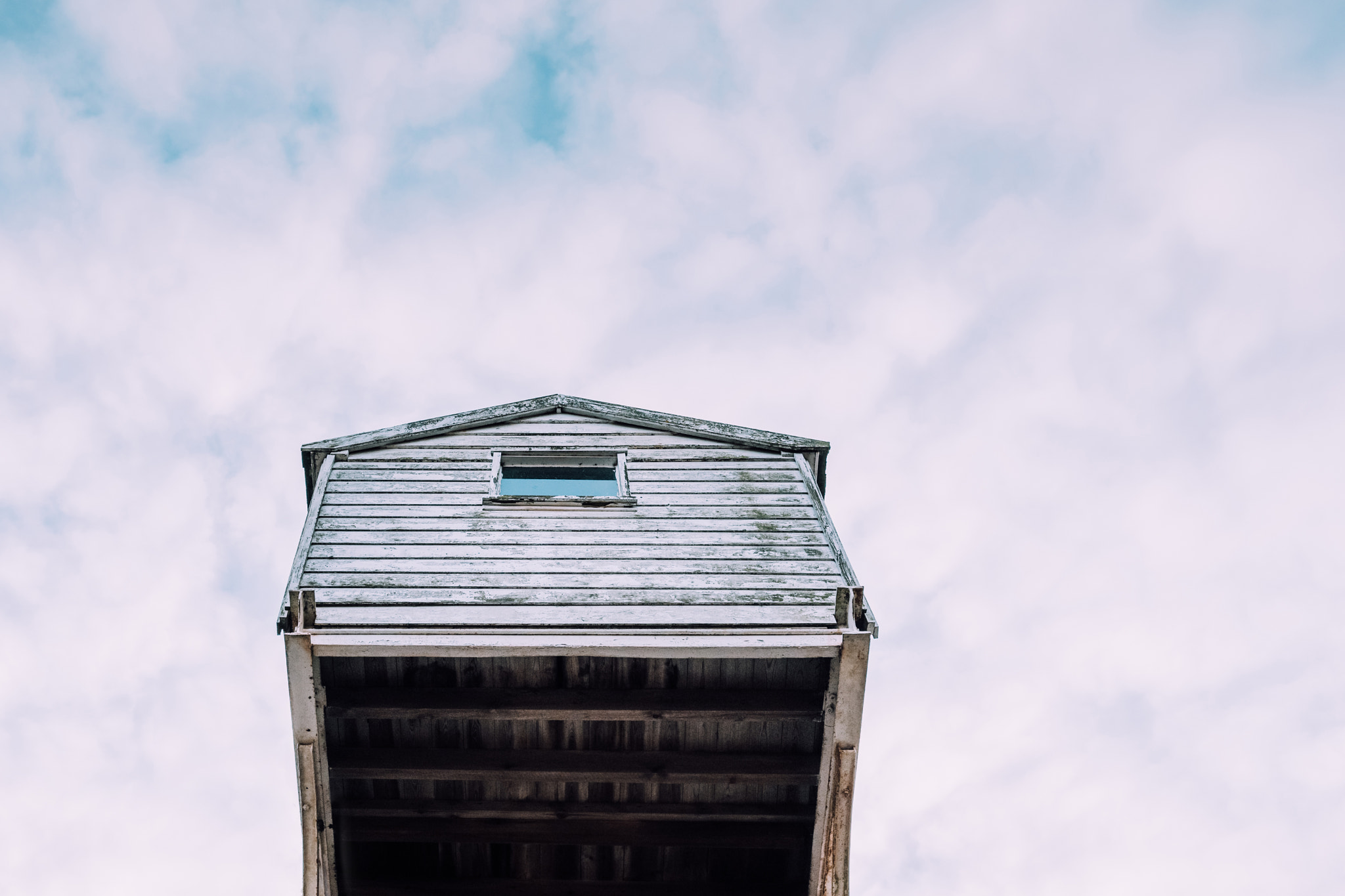 Fujifilm X-T2 + Fujifilm XF 23mm F2 R WR sample photo. Wood glass metal and clouds photography