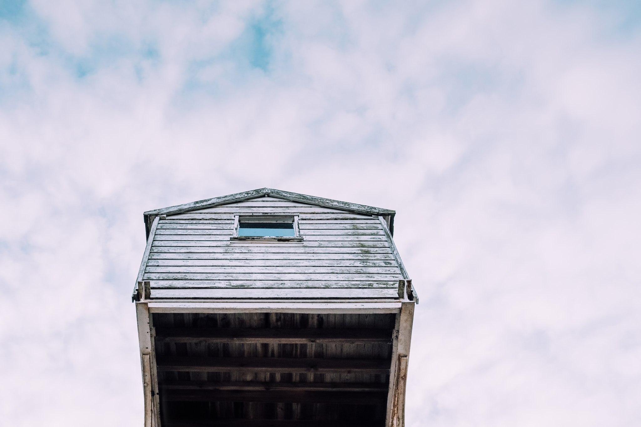 Fujifilm X-T2 sample photo. Wood glass metal and clouds photography