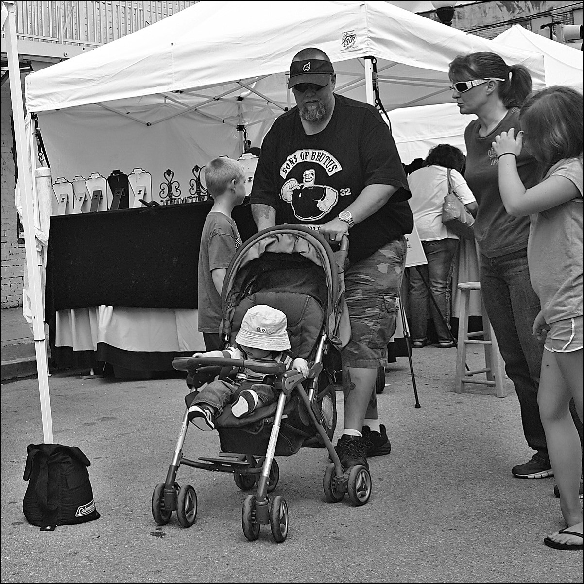 Olympus PEN E-PL2 sample photo. Son of brutus...with stroller photography