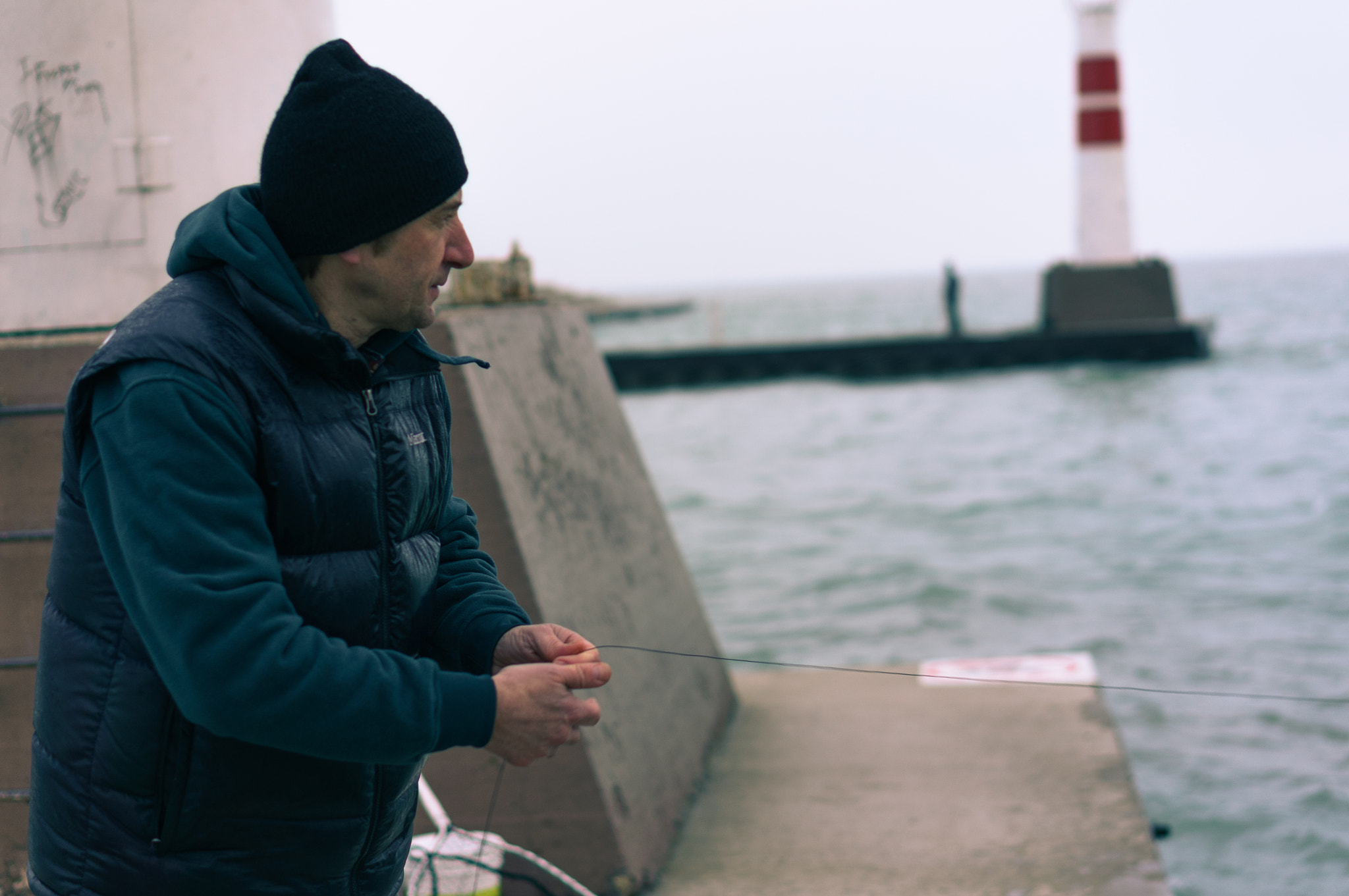 Sony Alpha NEX-5T sample photo. Fisherman, lake michigan, montrose harbor. photography