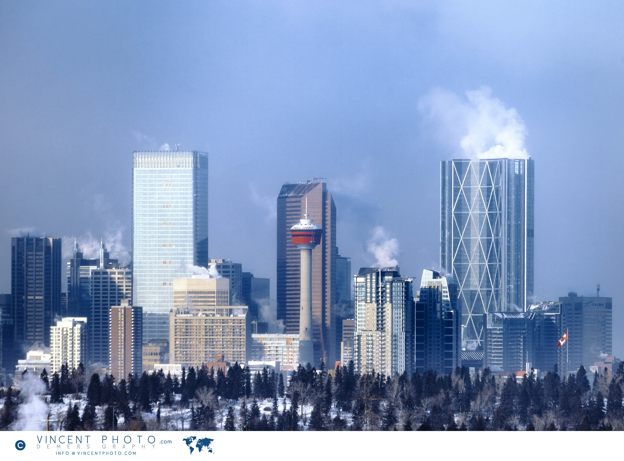 Canon EF 70-300mm F4-5.6 IS USM sample photo. Skyline of the city of calgary and its skyscrapers on a cold win photography