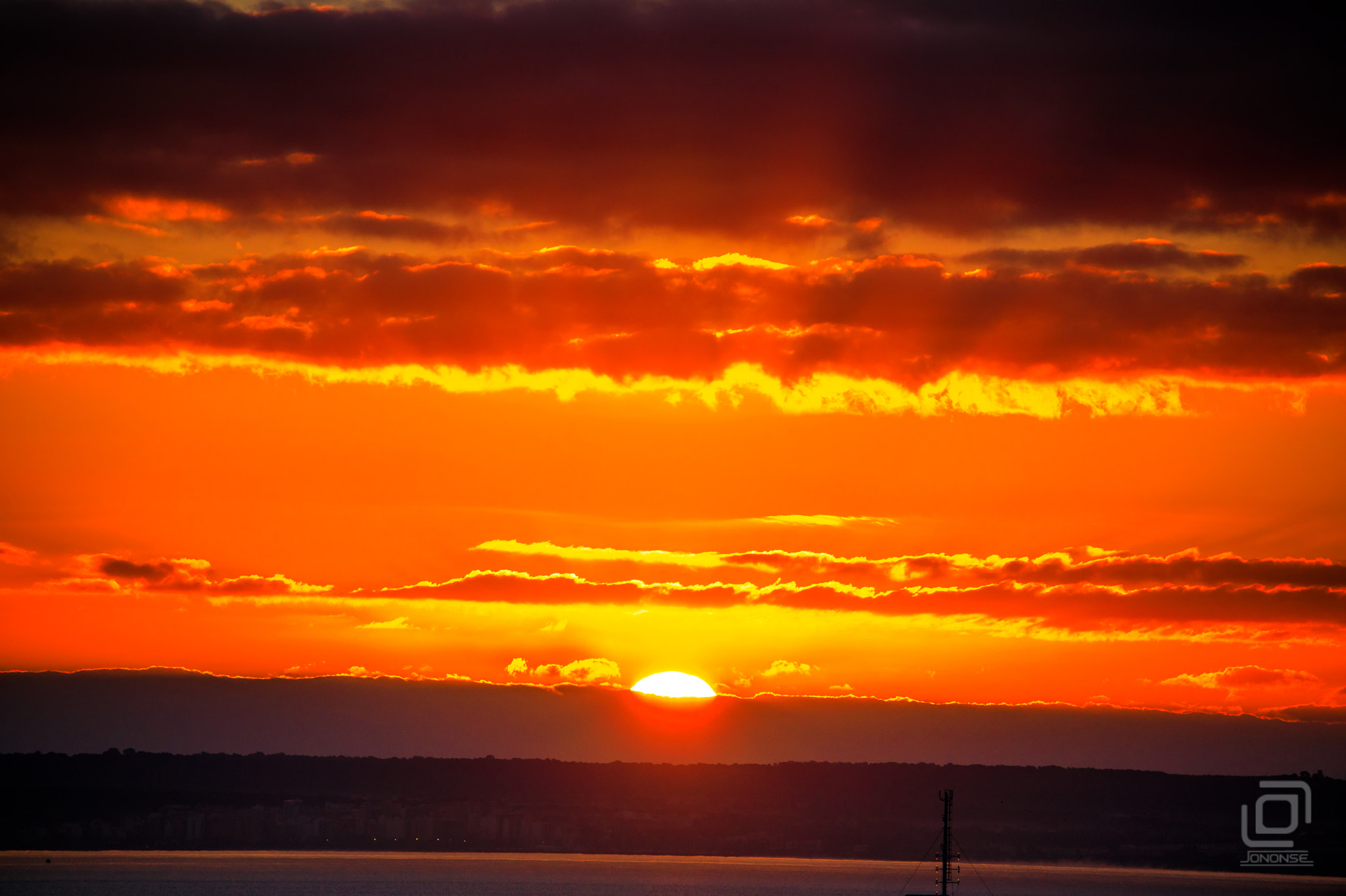 Canon EF 70-300mm F4-5.6L IS USM sample photo. Burning clouds photography