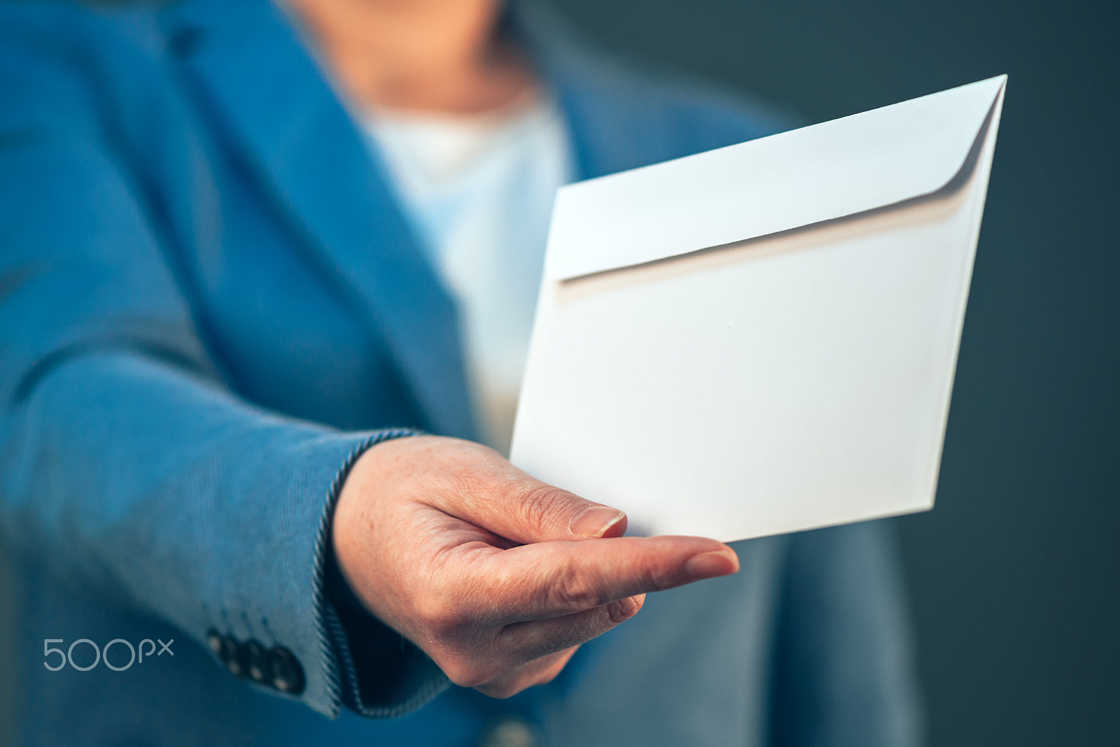 Nikon AF-S Micro-Nikkor 105mm F2.8G IF-ED VR sample photo. Business woman offering white envelope as bribe photography