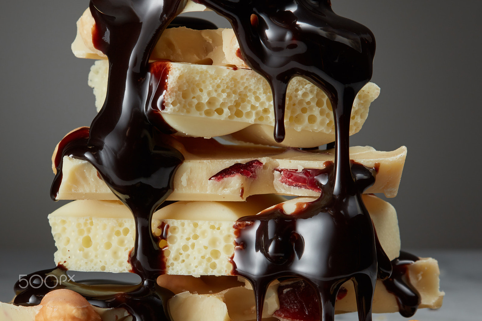 Canon EF 100mm F2.8 Macro USM sample photo. Syrop pouring onto a piece of chocolate photography