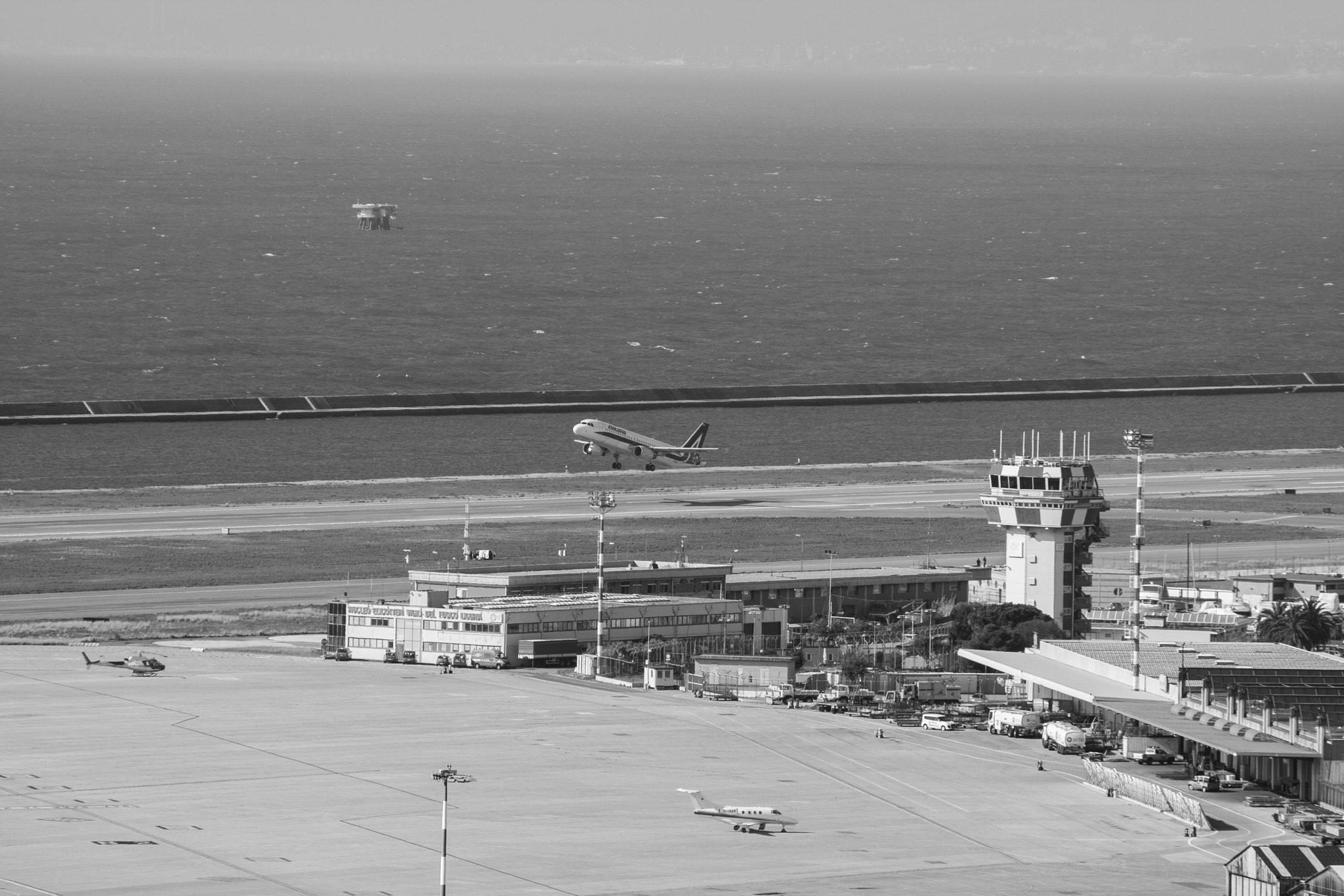 Canon EOS 40D + Canon EF 70-210mm f/4 sample photo. Take off photography