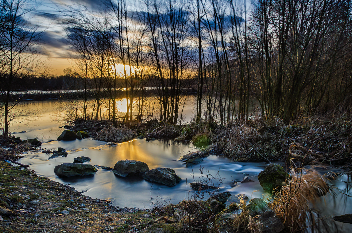 Sigma 17-50mm F2.8 EX DC OS HSM sample photo. Sunset with little waterfall near bielefeld photography
