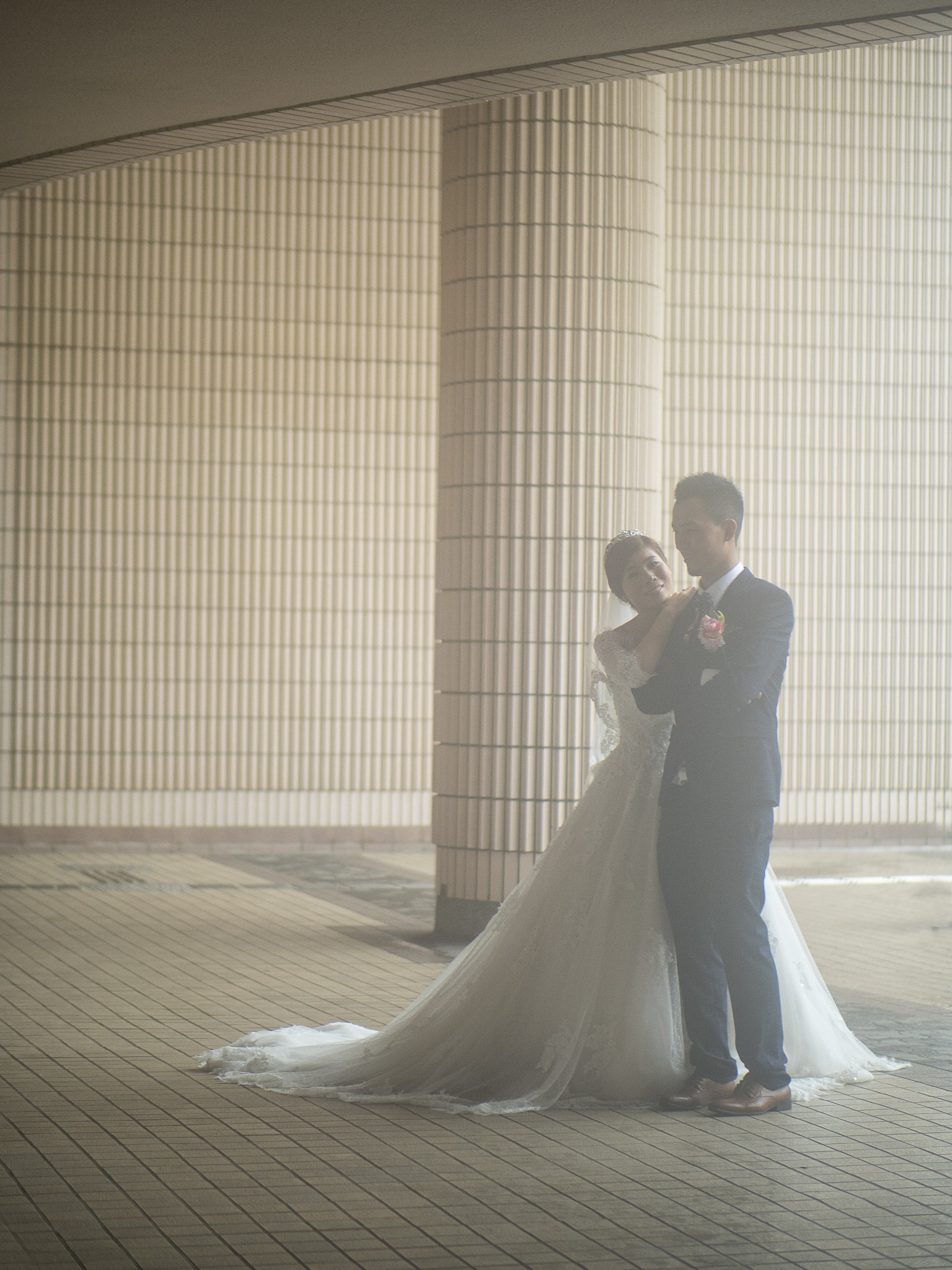 Panasonic Leica DG Nocticron 42.5mm F1.2 ASPH OIS sample photo. Wet wedding photography