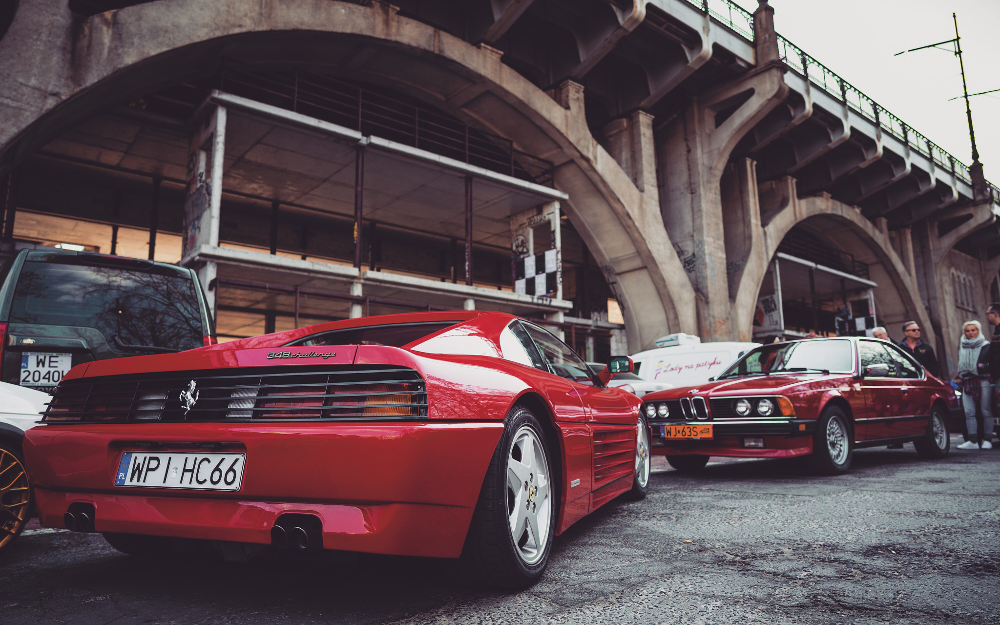 Sony a7R II + ZEISS Batis 25mm F2 sample photo. Ferrari & bmw street photography