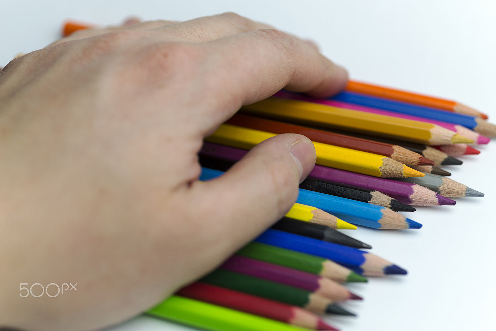 Nikon D600 + Nikon AF Micro-Nikkor 60mm F2.8D sample photo. Hand holding colored pencils. photography