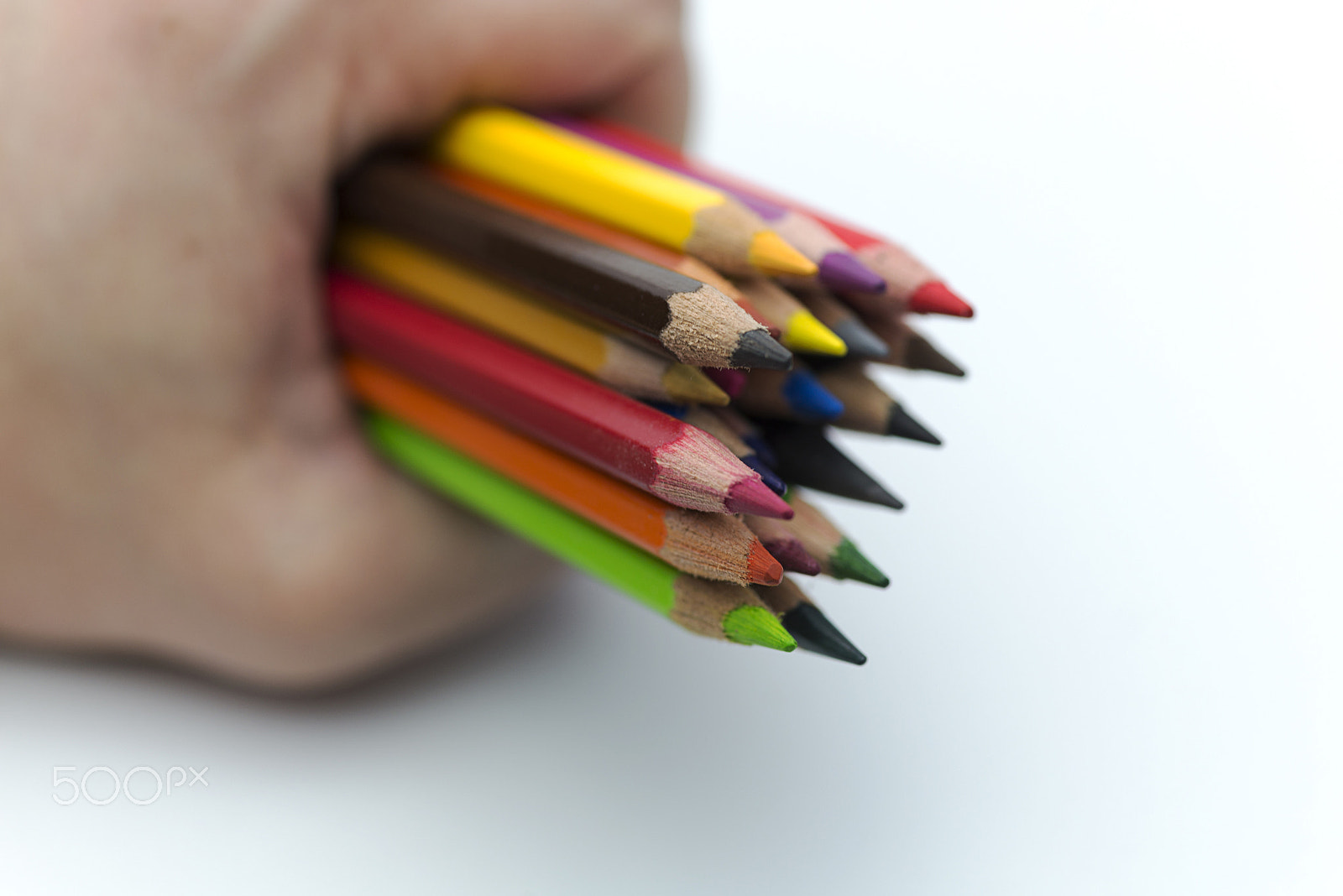 Nikon D600 + Nikon AF Micro-Nikkor 60mm F2.8D sample photo. Hand holding colored pencils. photography