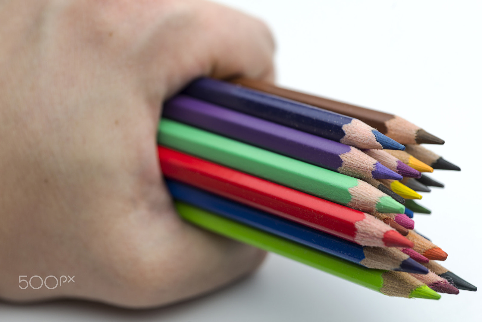 Nikon D600 + Nikon AF Micro-Nikkor 60mm F2.8D sample photo. Hand holding colored pencils. photography