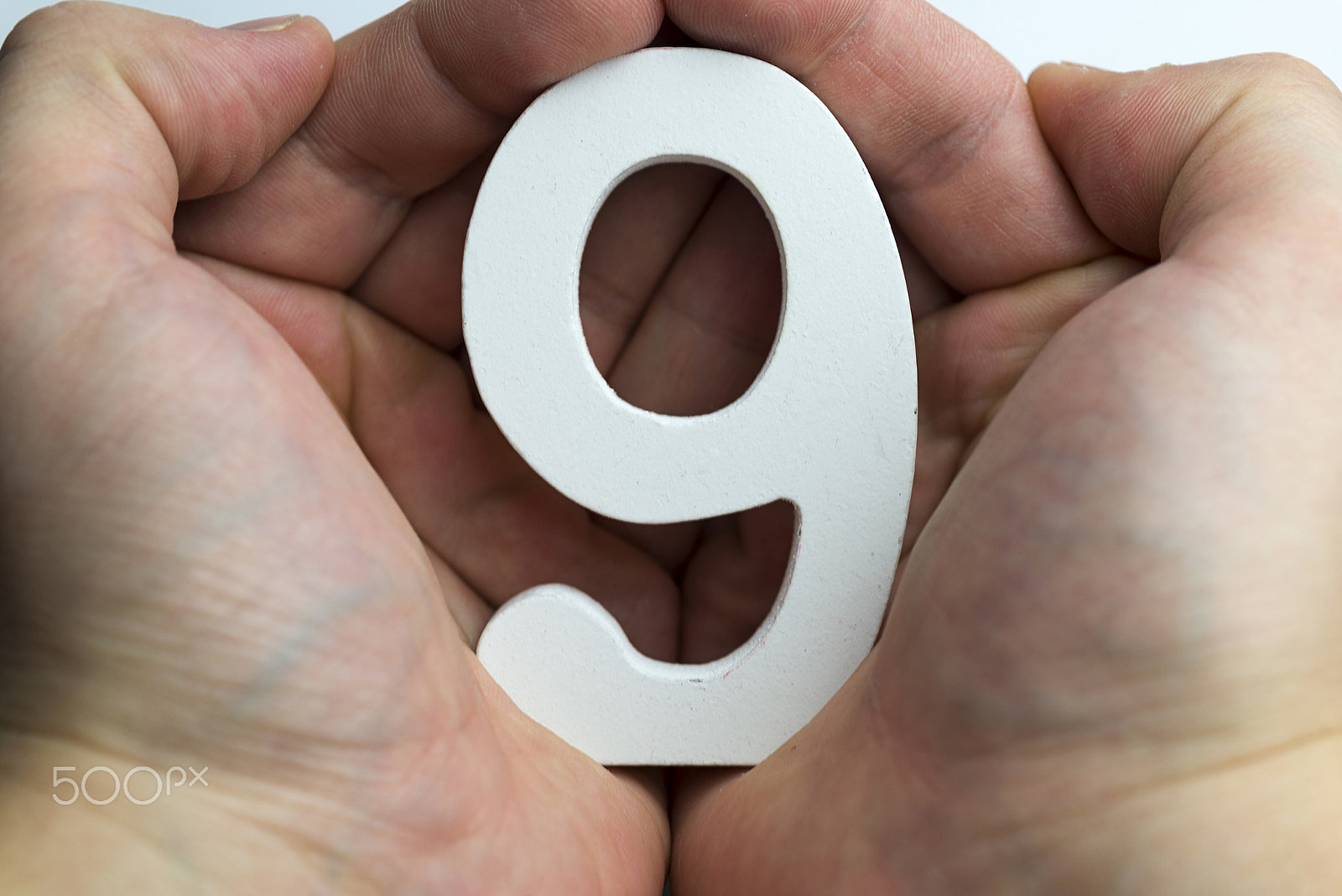 Nikon D600 + Nikon AF Micro-Nikkor 60mm F2.8D sample photo. Hand holding number nine. photography