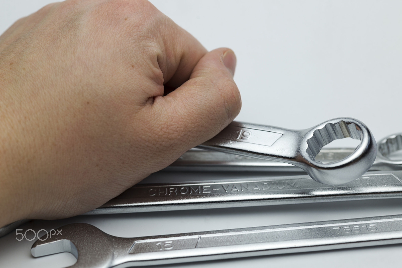 Nikon D600 + Nikon AF Micro-Nikkor 60mm F2.8D sample photo. Hand holds a key union. photography