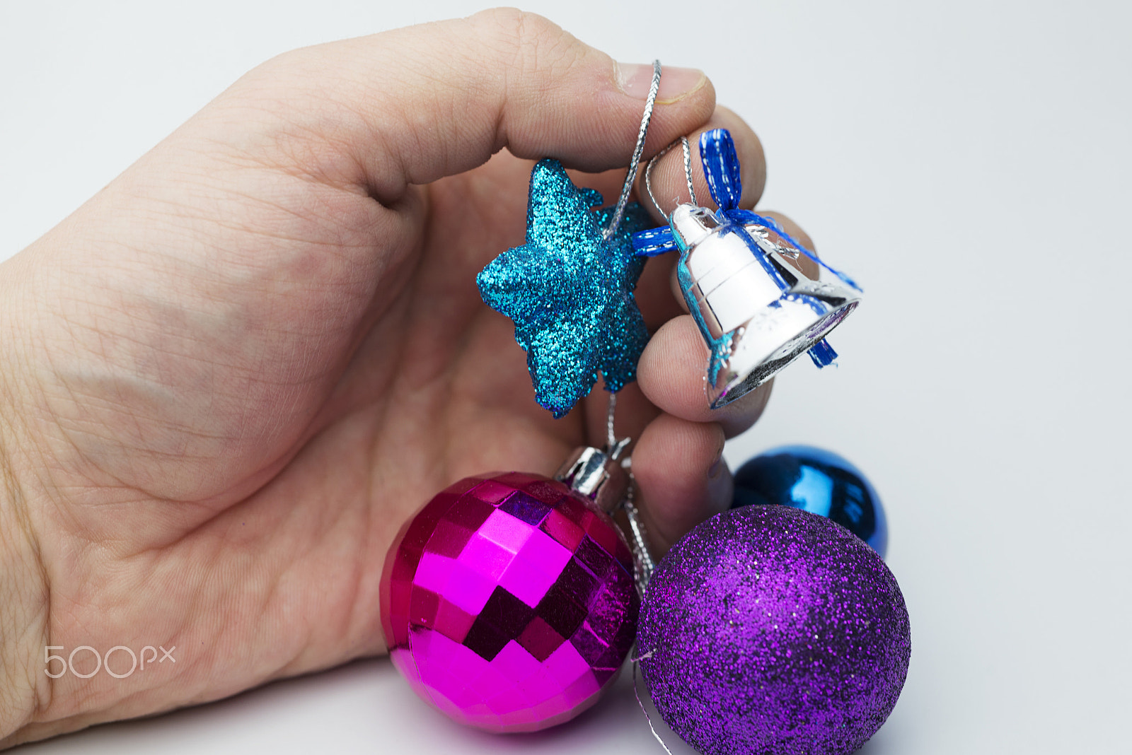 Nikon D600 + Nikon AF Micro-Nikkor 60mm F2.8D sample photo. Hands holding christmas decorations. photography