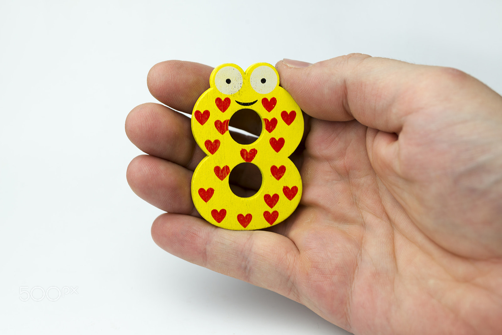Nikon D600 + Nikon AF Micro-Nikkor 60mm F2.8D sample photo. Hand holding number eight. photography