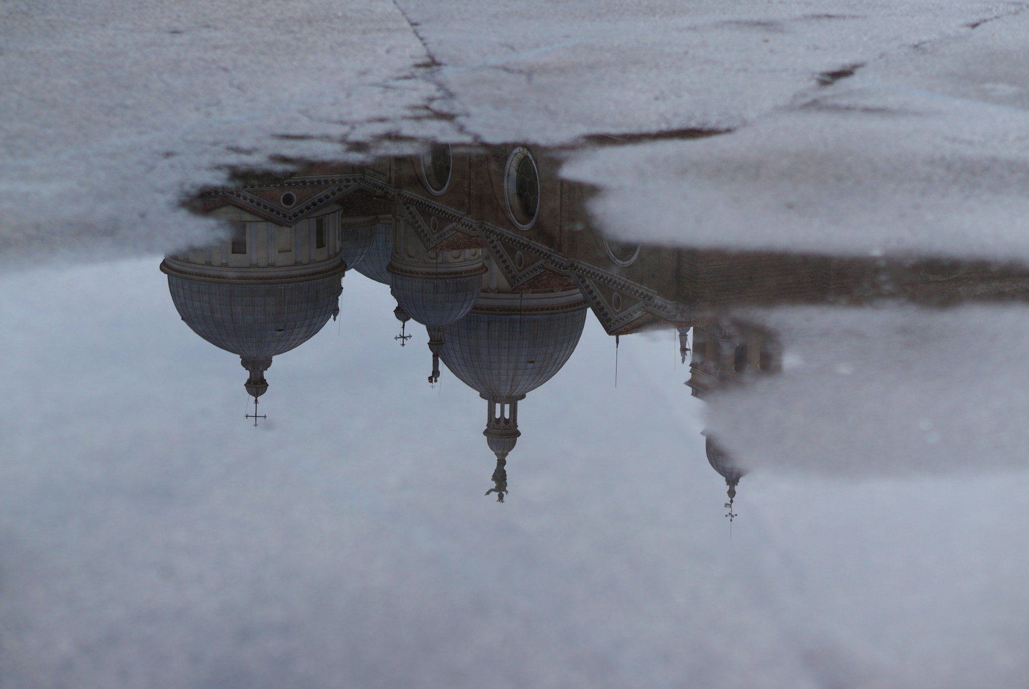 Sony E 50mm F1.8 OSS sample photo. Basilica di santa giustina. in a puddle. photography