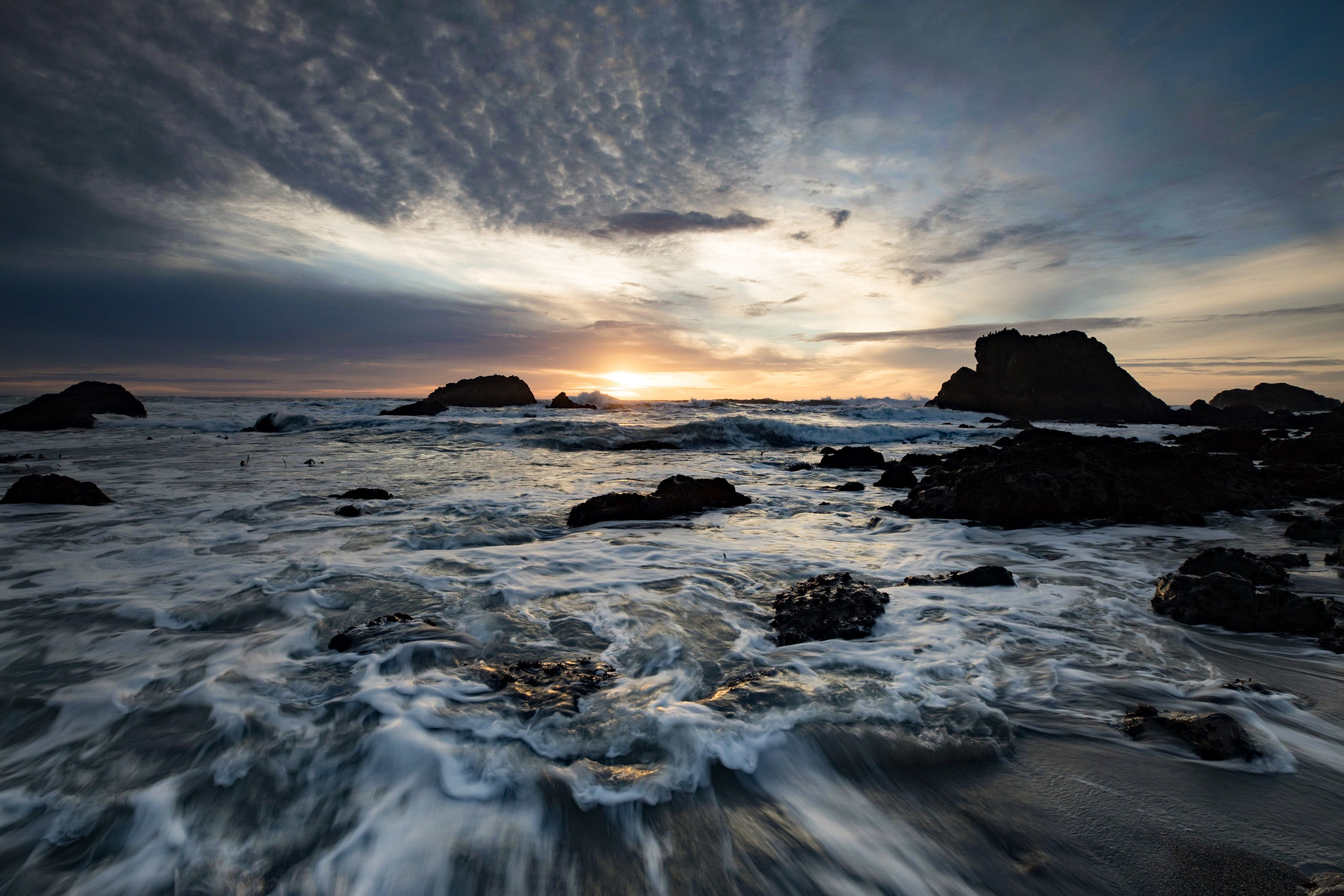 Canon EF 16-35mm F2.8L III USM sample photo. Glistening rocks at sea photography