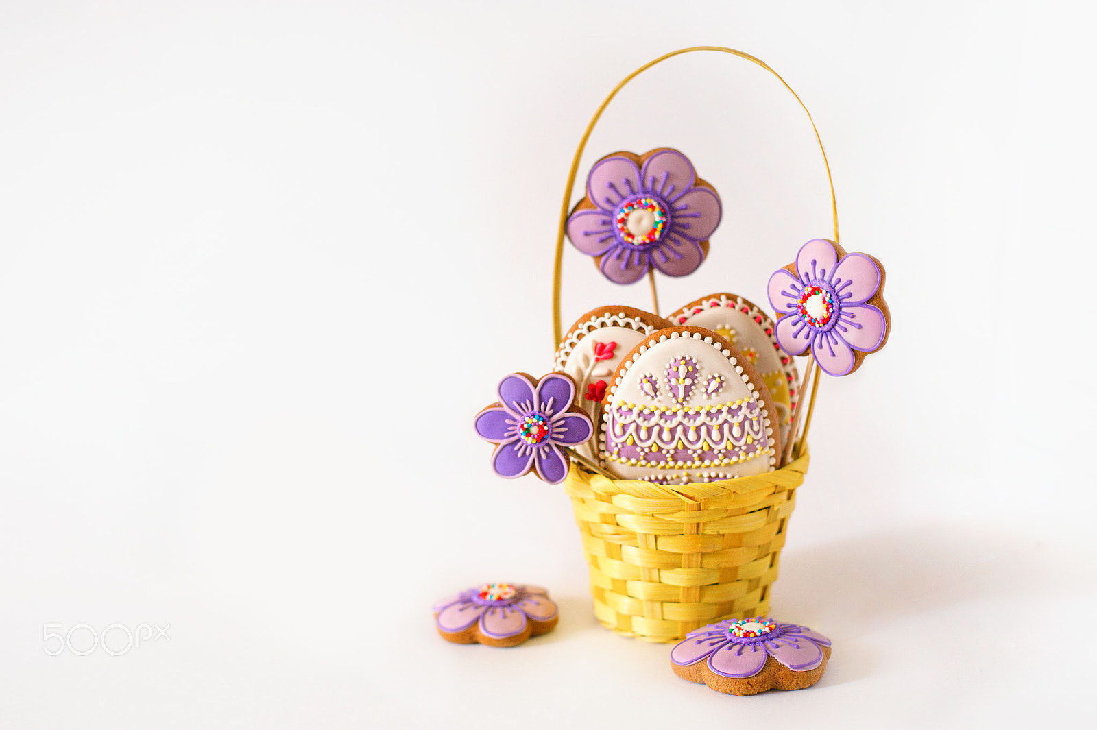 Nikon D700 + Nikon AF Nikkor 50mm F1.4D sample photo. Little easter is on a festive scarf. multi-colored easter eggs lie in a basket with decoration... photography