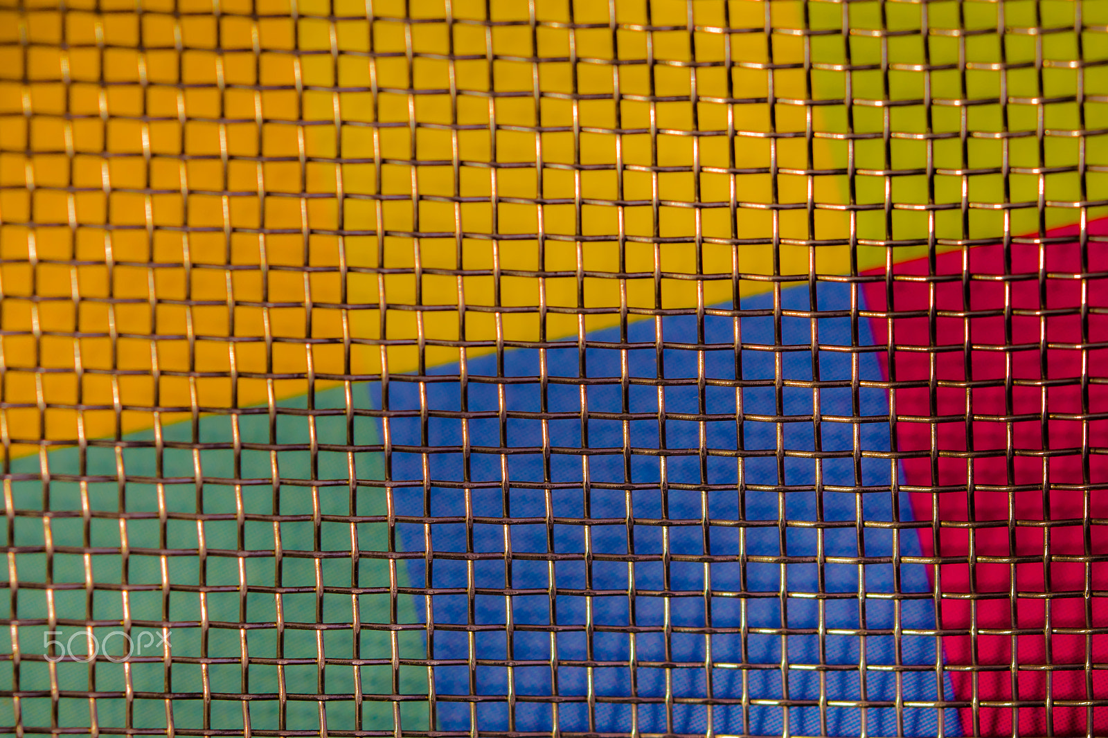 Canon EF 100mm F2.8L Macro IS USM sample photo. Colors behind a grid photography