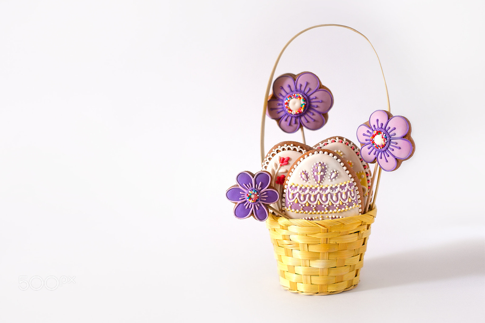 Nikon D700 + Nikon AF Nikkor 50mm F1.4D sample photo. Wicker basket with tasty easter cookies on kitchen table photography