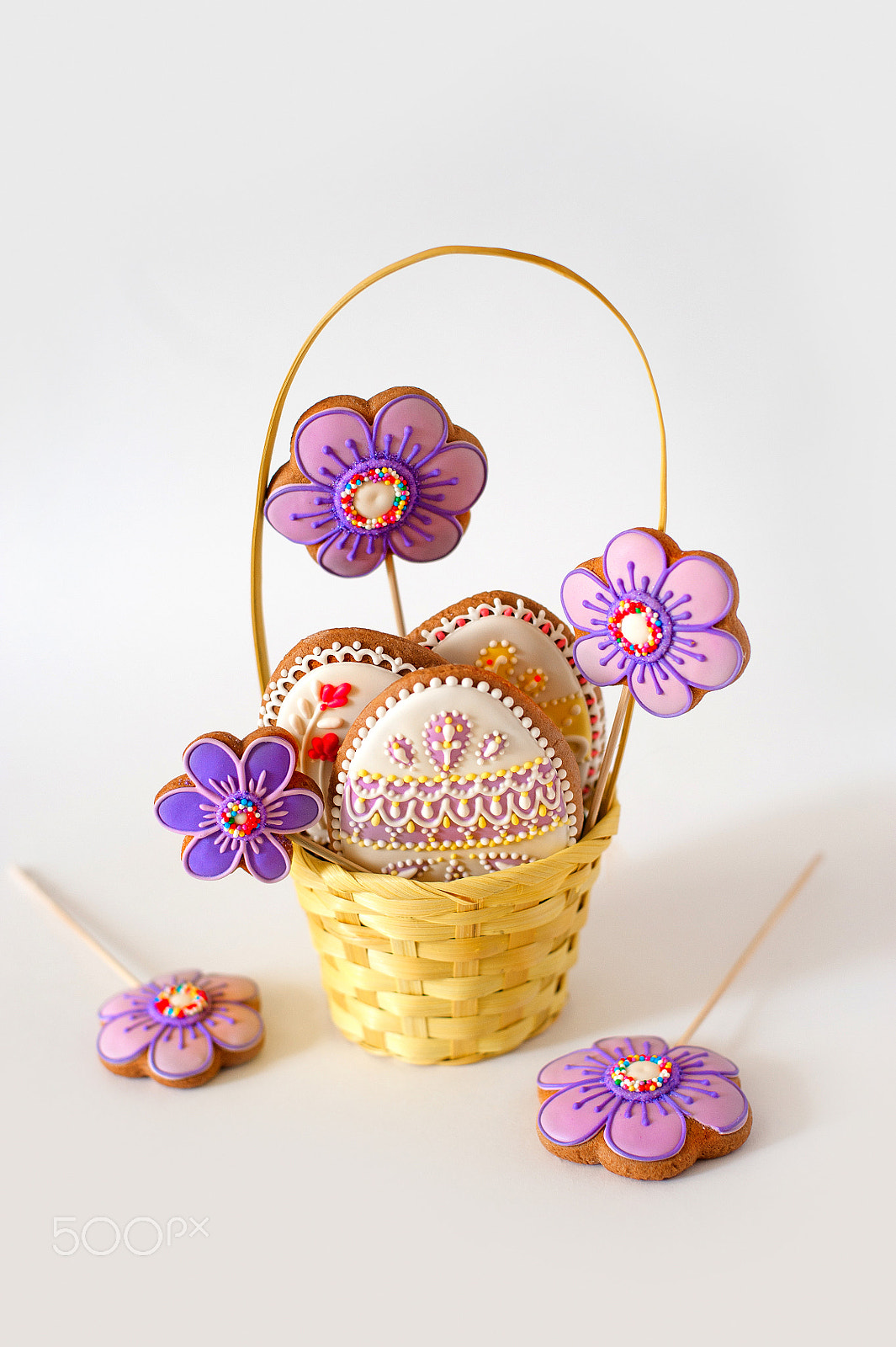 Nikon D700 + Nikon AF Nikkor 50mm F1.4D sample photo. Little easter is on a festive scarf. multi-colored easter eggs lie in a basket with decoration... photography